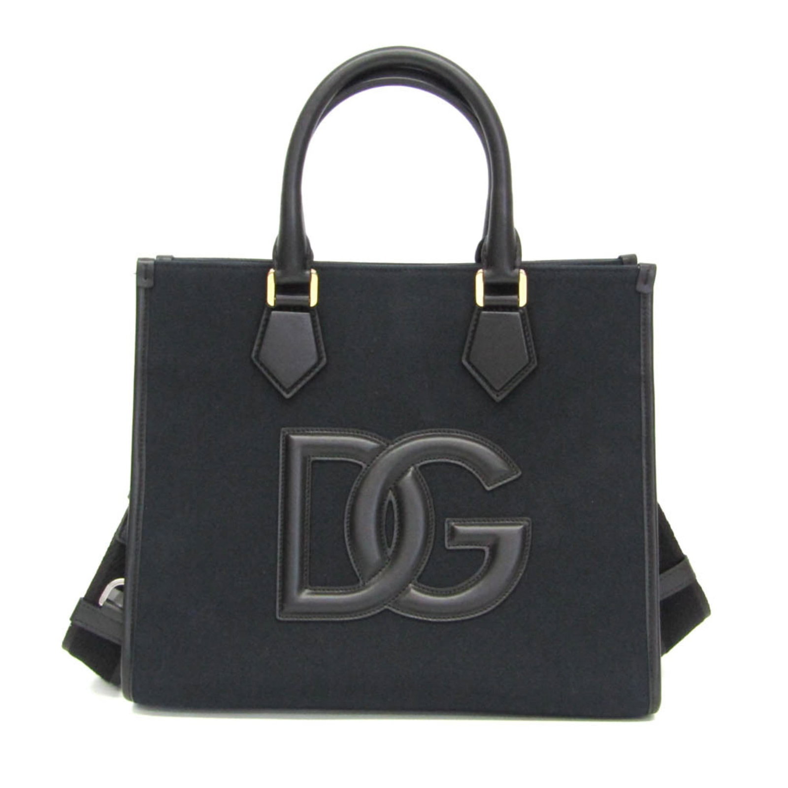 Shoulder Bag Canvas Tote Leather Dolce Gabbana: Shoulder Bag Canvas Tote Leather Dolce Gabbana Canvas and leather combine in sleek, black Dolce & Gabbana design. The bag features a magnetic snap closure, zipper pocket, and open pocket for added
