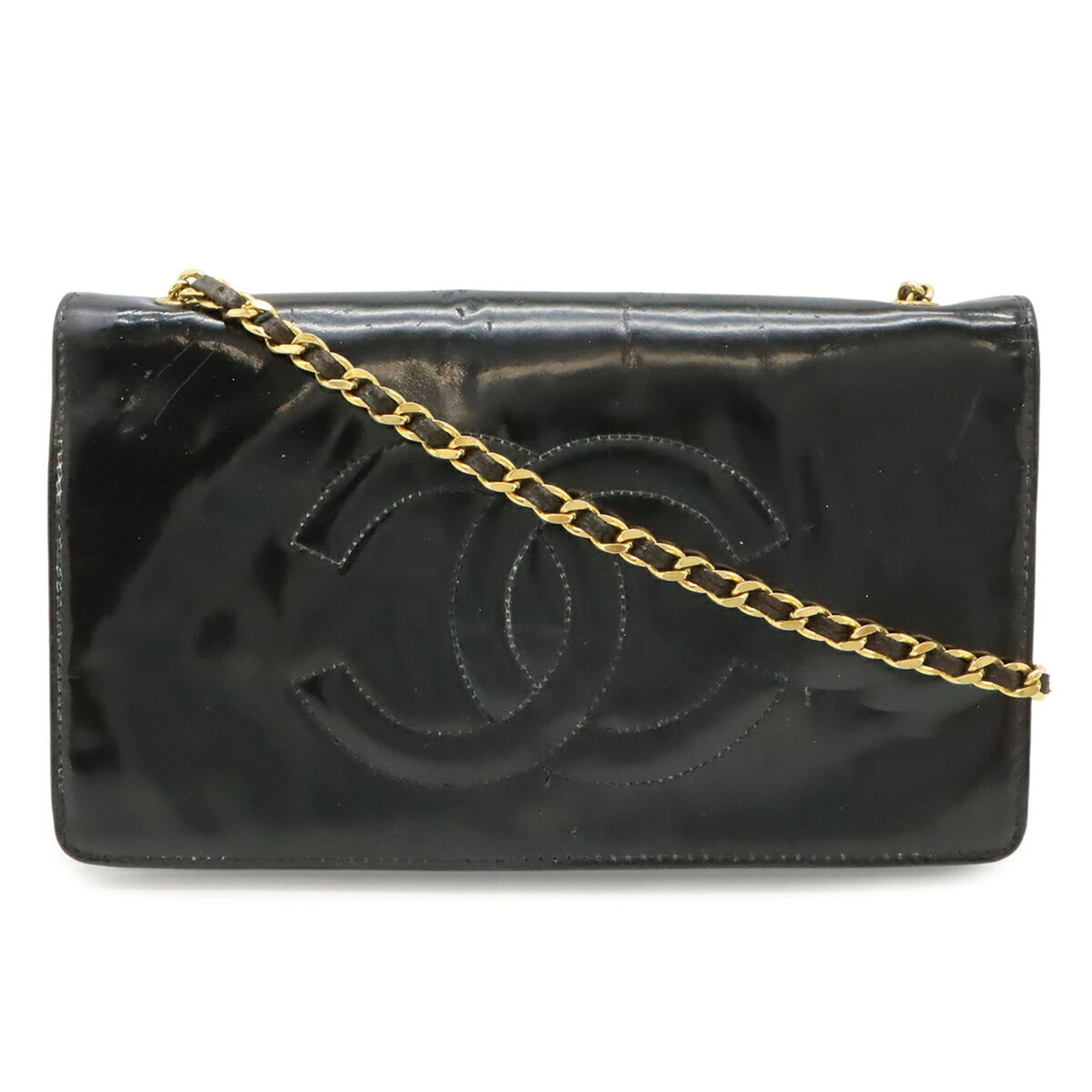 Shoulder Bag Pochette Leather Chanel: Shoulder Bag Pochette Leather Chanel Black leather pochette shoulder bag from Chanel, measuring 12cm x 21cm x 2cm. This sleek and compact design features a classic Chanel style with clean lines and mi