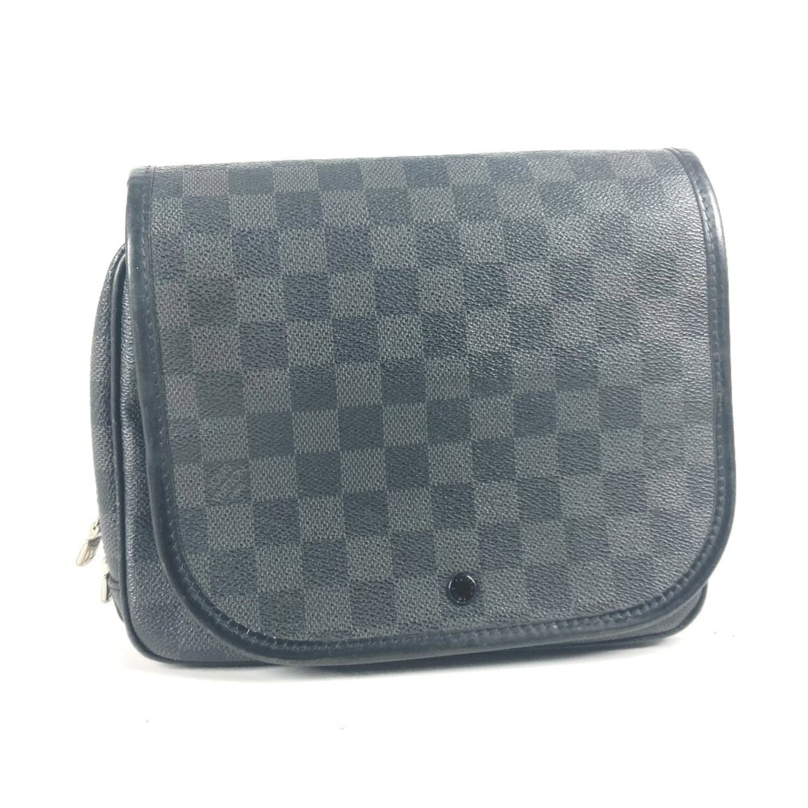 Pouch Damier Graphite by Louis Vuitton: Pouch Damier Graphite by Louis Vuitton Black Damier Graphite Pouch by Louis Vuitton, measuring 19.5cm x 22cm x 7cm, features the iconic Damier Graphite pattern in a sleek black finish. This compact po