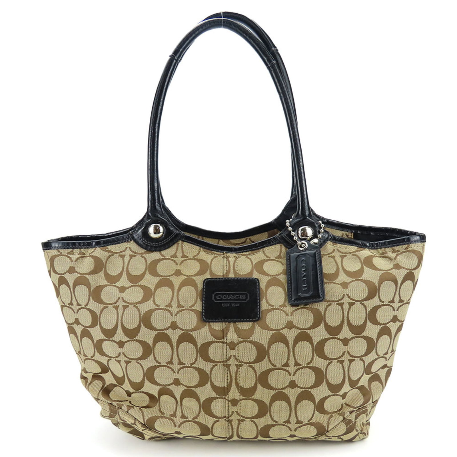 Patent Leather Canvas Tote Bag: Patent Leather Canvas Tote Bag Canvas and patent leather come together in this stylish tote bag, available in two sleek colors. Measuring 23.5cm x 42cm x 11cm, it's a compact yet spacious accessory