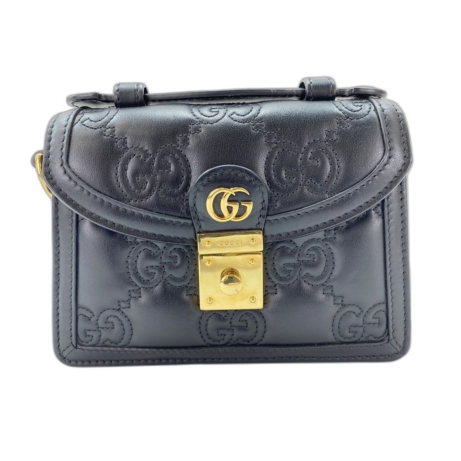 Handbag by Gucci: Handbag by Gucci Black Gucci handbag with 106cm strap length and 3.00cm handle drop, measuring 13cm x 18cm x 4cm. This sleek design features a compact size and sturdy construction. The bag's black