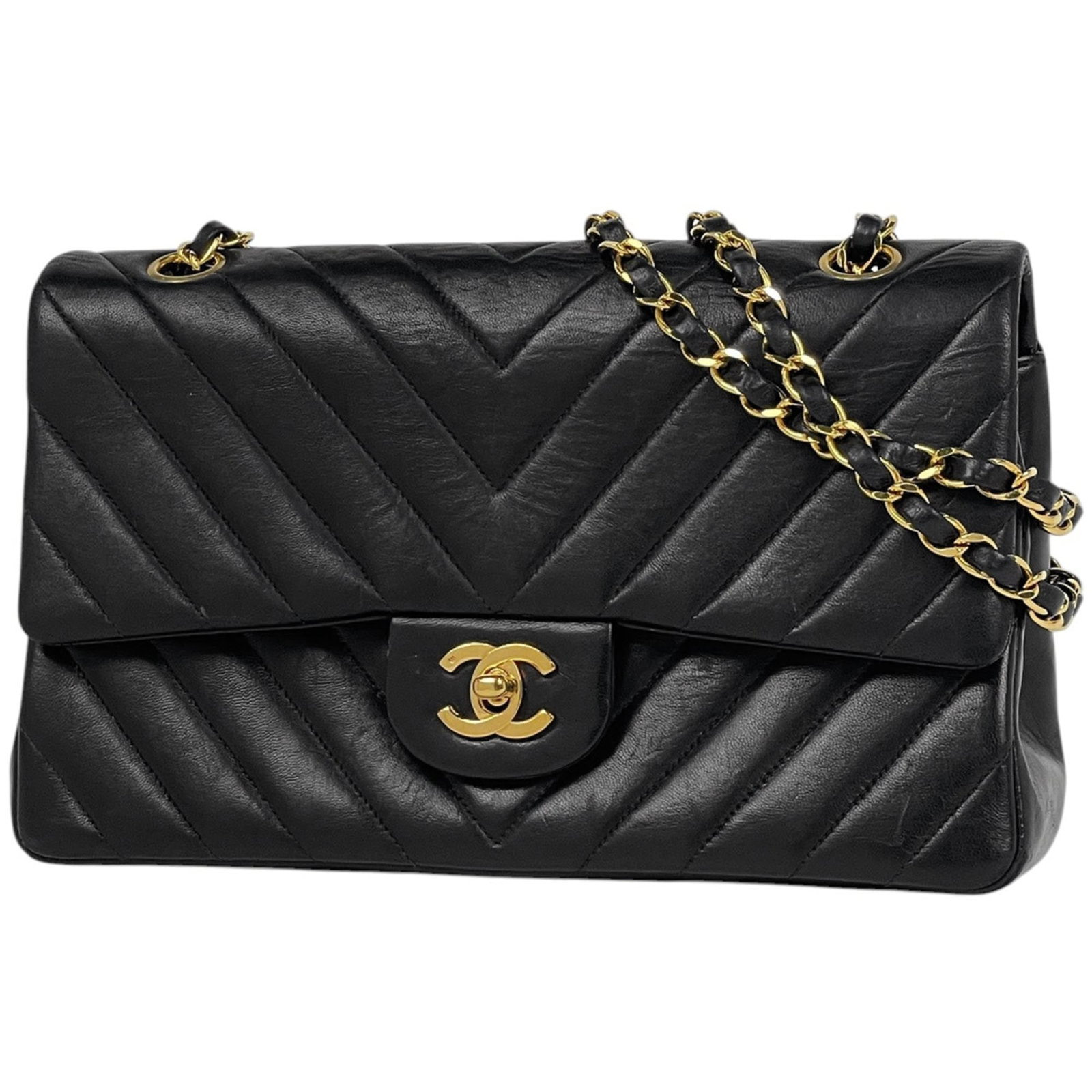 Shoulder Bag Leather Chanel: Shoulder Bag Leather Chanel Black leather shoulder bag from Chanel, measuring 15.5cm x 25.5cm x 7cm. This classic design features high-quality materials and a timeless silhouette. The signature on the