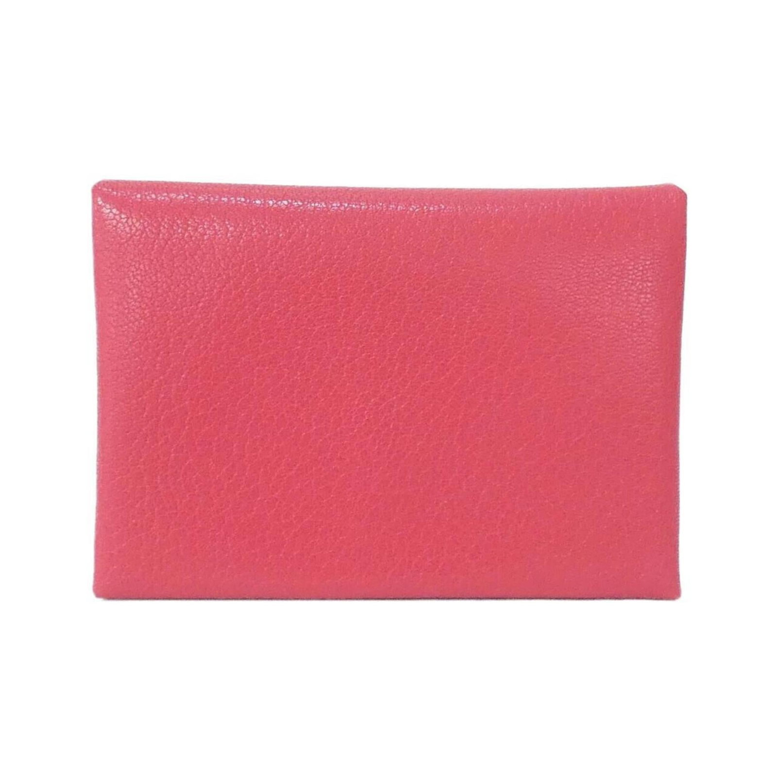 Coin purse by Hermes: Coin purse by Hermes This exquisite coin purse by Hermes features a delicate pink hue and measures 7cm x 10cm x 1.5cm, making it a stylish accessory for everyday use. The item comes in its original