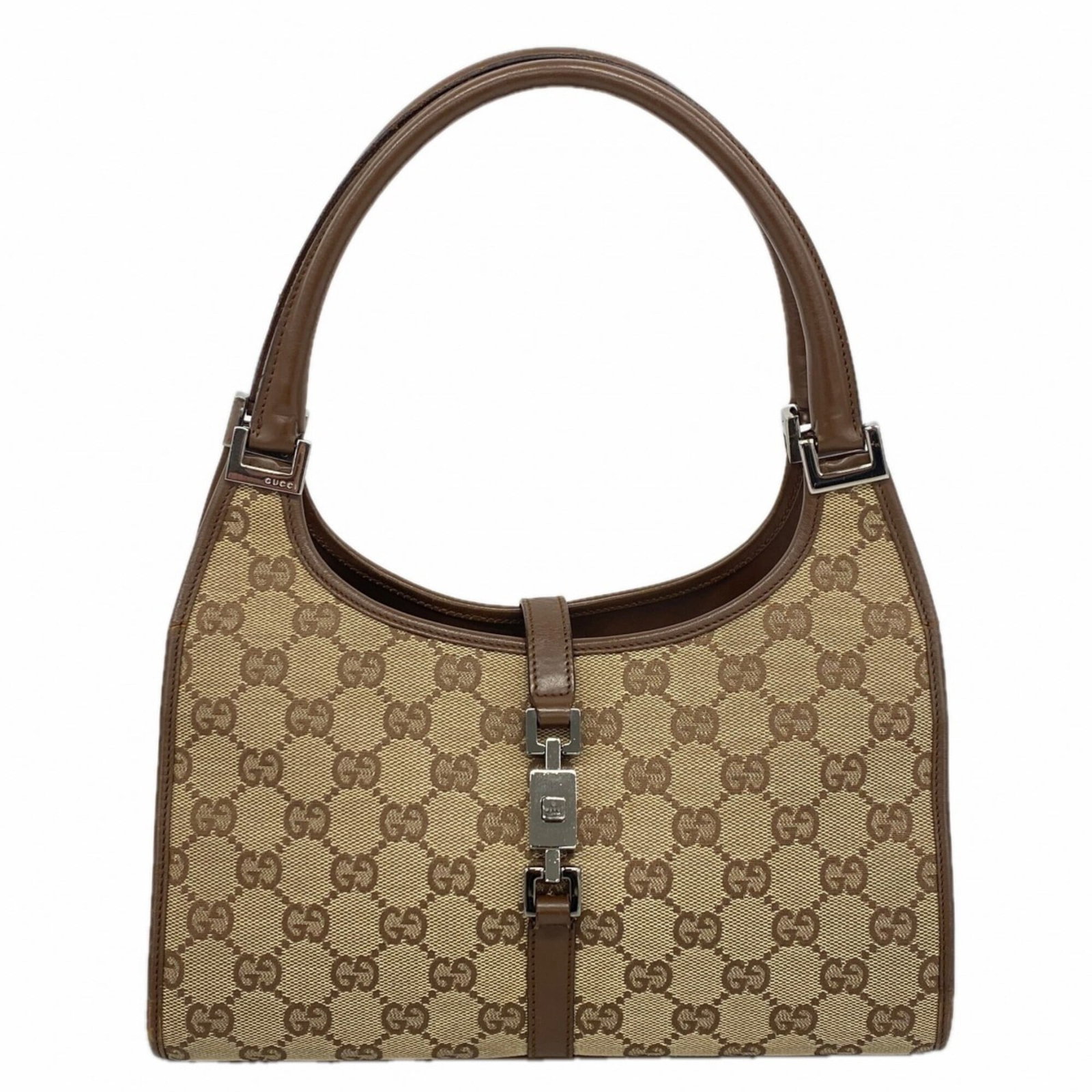 Canvas handbag Gucci: Canvas handbag Gucci Canvas handbag from Gucci, featuring a classic brown canvas design with silver hardware. Measuring 15cm x 26cm x 6cm, it has a timeless and versatile size that suits various