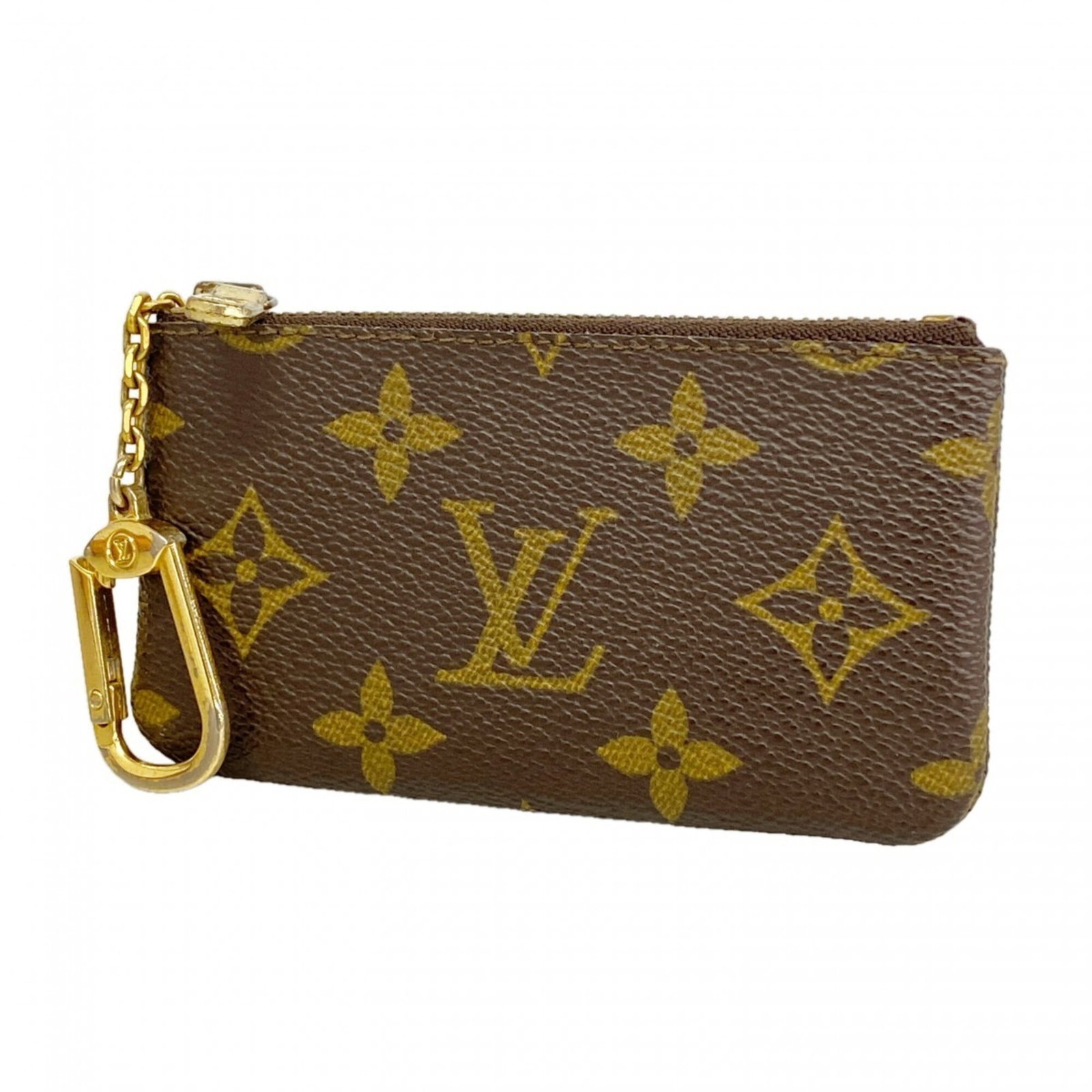 Coin purse from Louis Vuitton: Coin purse from Louis Vuitton Brown Louis Vuitton coin purse with classic design, measuring 6.5cm x 11.5cm x 1cm, perfect for carrying small essentials in a stylish and compact way. This iconic piece 