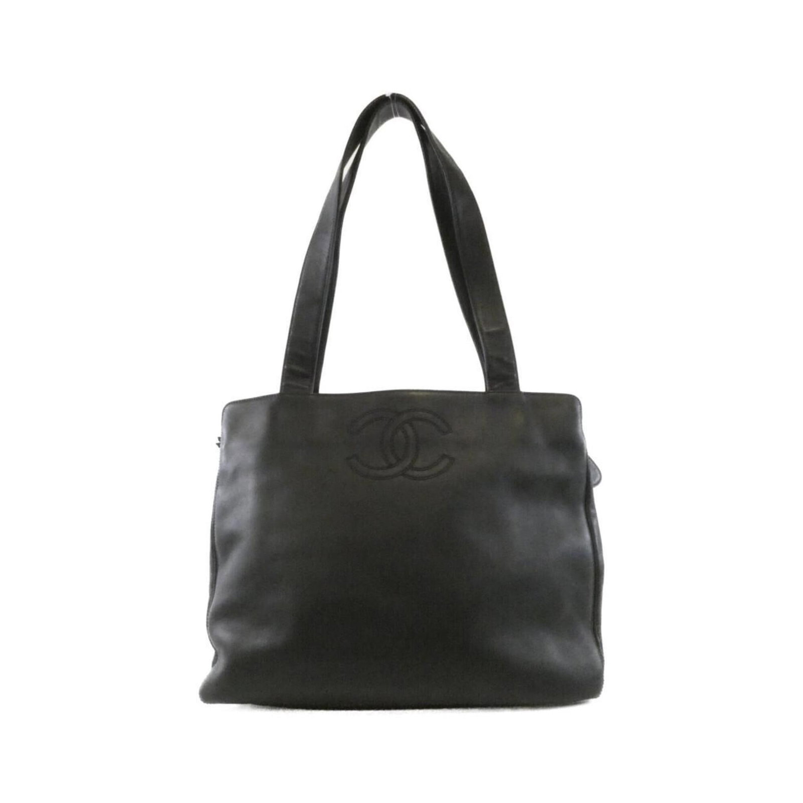 Leather Handbag Chanel: Leather Handbag Chanel Leather Handbag Chanel - A Timeless Black Classic. This black lambskin leather handbag from Chanel features clean lines and a sleek design, measuring 28cm x 36cm x 8cm. With