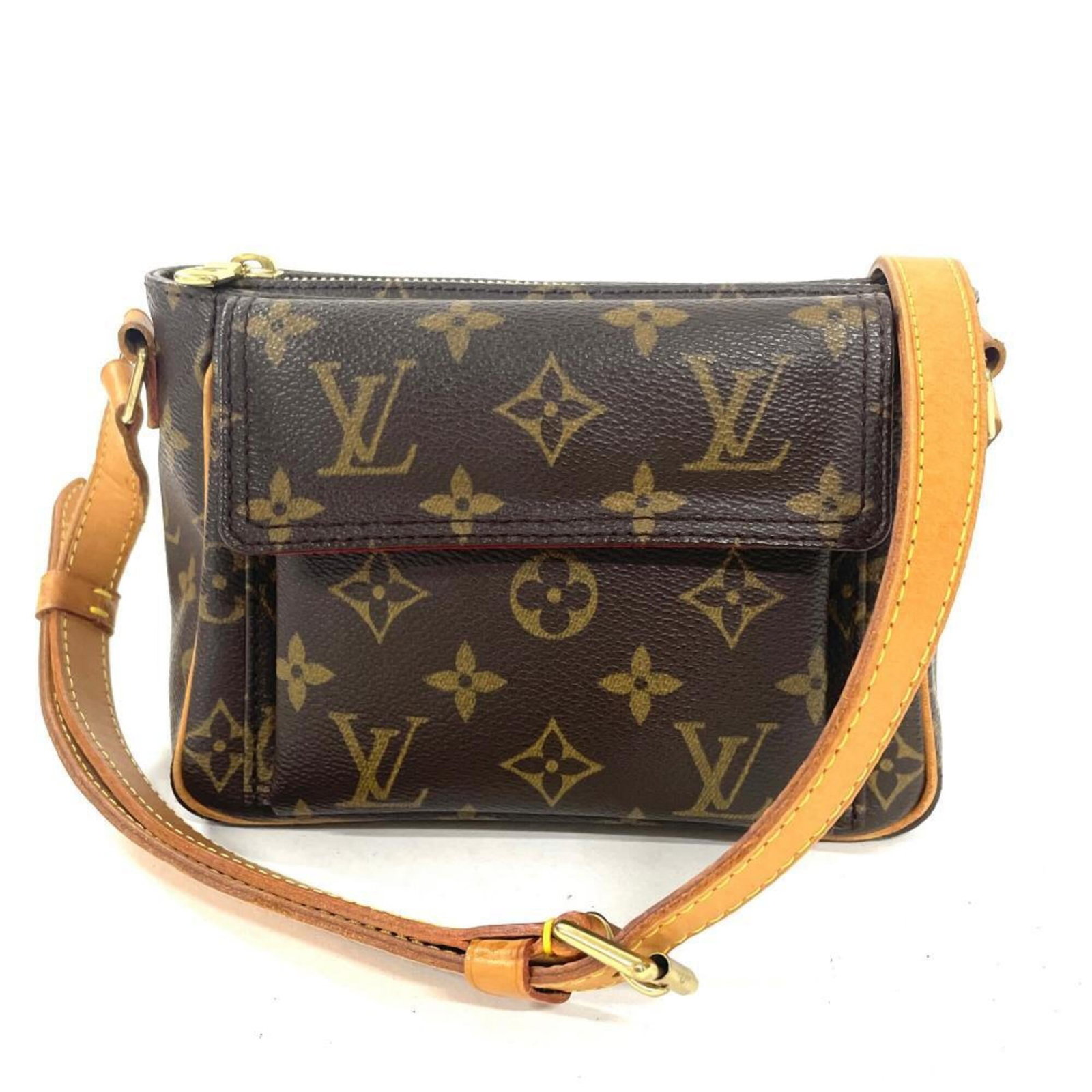 Shoulder Bag Monogram By Louis Vuitton: Shoulder Bag Monogram By Louis Vuitton Monogrammed luxury awaits with this Louis Vuitton shoulder bag, boasting the iconic monogram pattern in rich brown and gold hardware. Measuring just 14cm x 19cm 