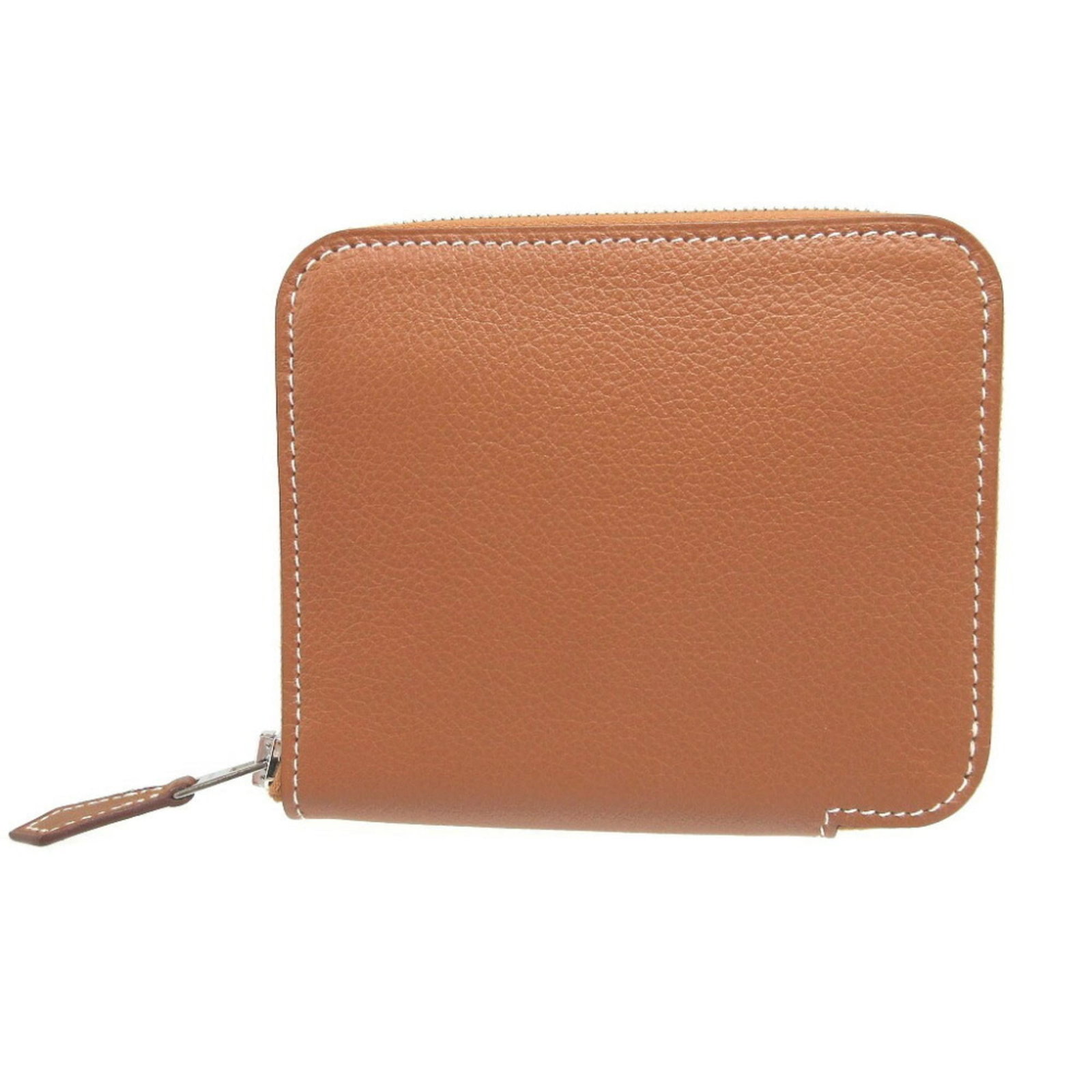 Coin purse silk from Hermes: Coin purse silk from Hermes This exquisite coin purse from Hermes features luxurious silk material in gold, showcasing the brand's signature elegance. Measuring 10cm x 11.5cm x 1.5cm, it comes