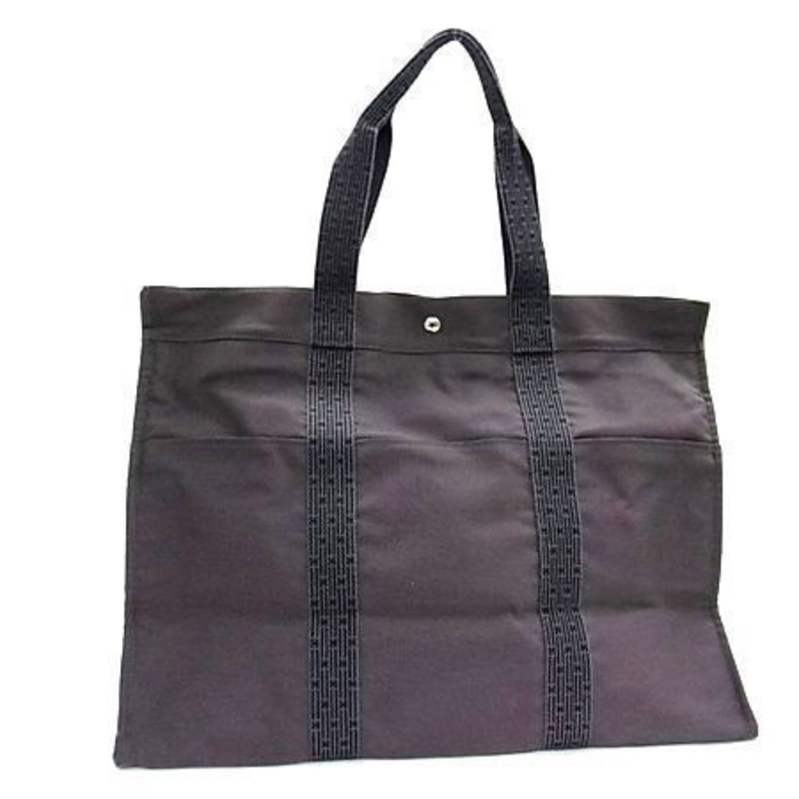 Canvas Hermes Tote Bag: Canvas Hermes Tote Bag Canvas Hermes Tote Bag, featuring a timeless gray color and classic design. Measuring 43cm x 56.5cm x 26cm, this tote bag offers a spacious interior with a durable canvas materi
