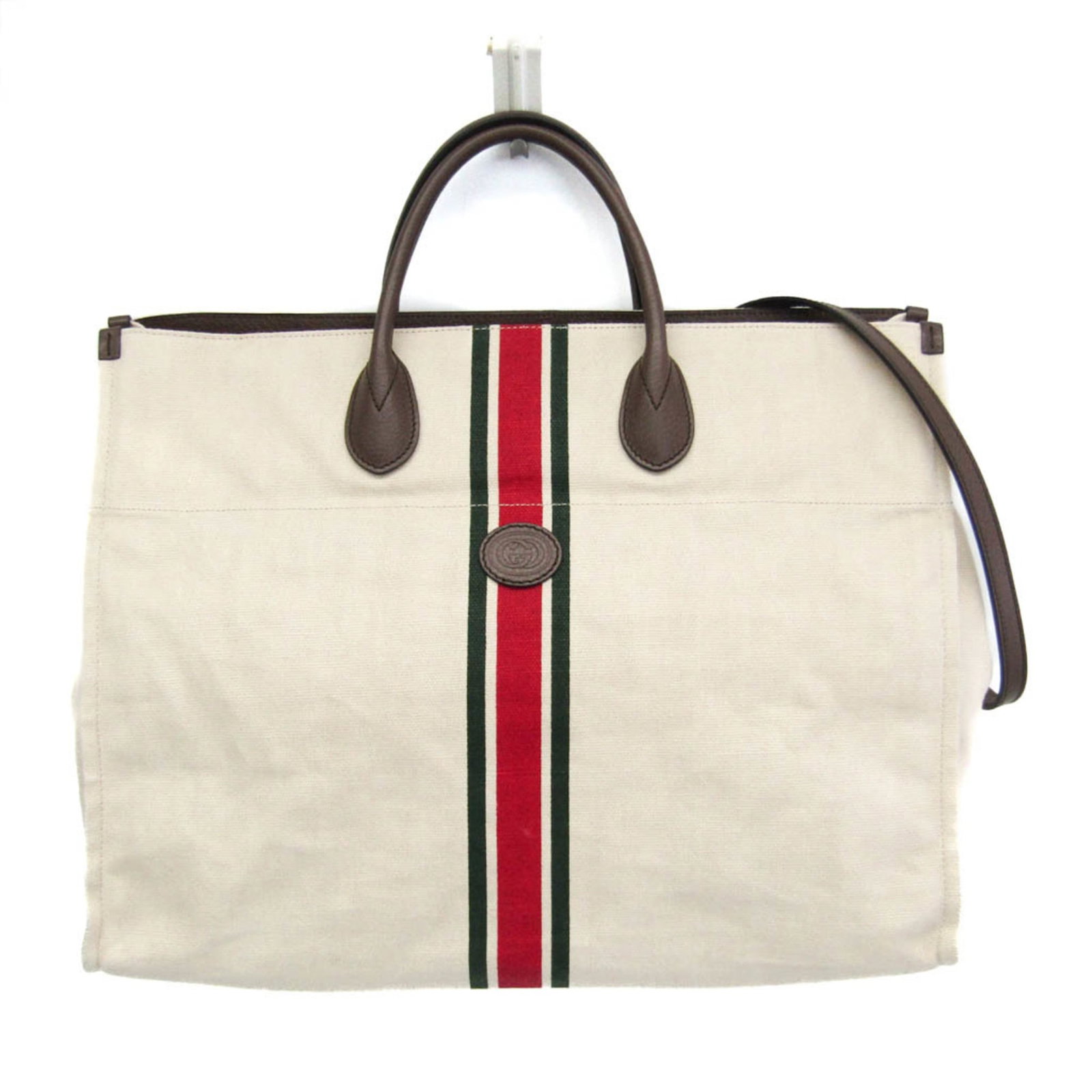 Canvas Leather Gucci Bag Tote Shoulder: Canvas Leather Gucci Bag Tote Shoulder Canvas Leather Gucci Bag Tote Shoulder. This Gucci bag features canvas and leather materials, an off-white color, and interlocking G logo details. The bag has a 