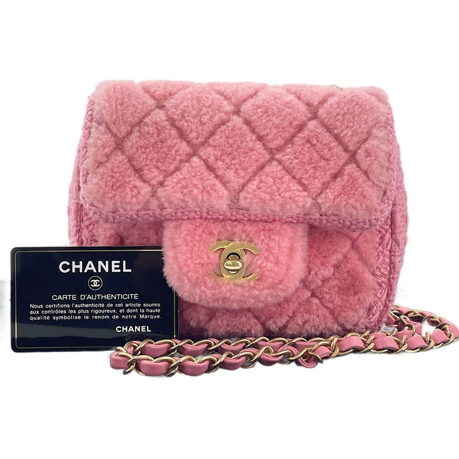 Shoulder Bag by Chanel: Shoulder Bag by Chanel Pink shoulder bag by Chanel, measuring 13cm x 14cm x 7cm. This compact and stylish accessory features a classic design with clean lines and a signature Chanel aesthetic. Made