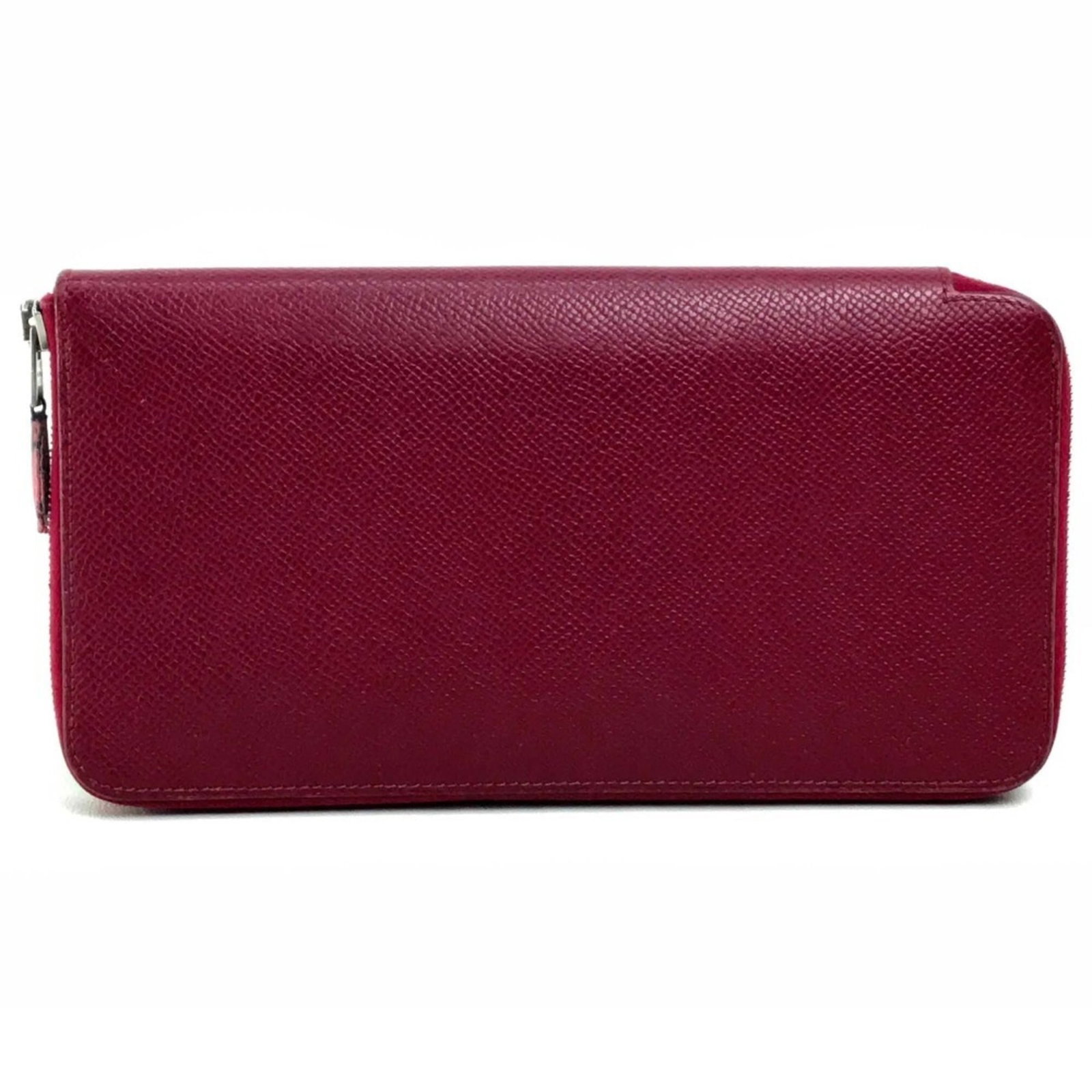 Epsom Leather Bi Fold Wallet Hermes: Epsom Leather Bi Fold Wallet Hermes Epsom Leather Bi Fold Wallet by Hermes features a Ruby color and zipper closure, making it a stylish accessory for everyday use. The wallet boasts multiple