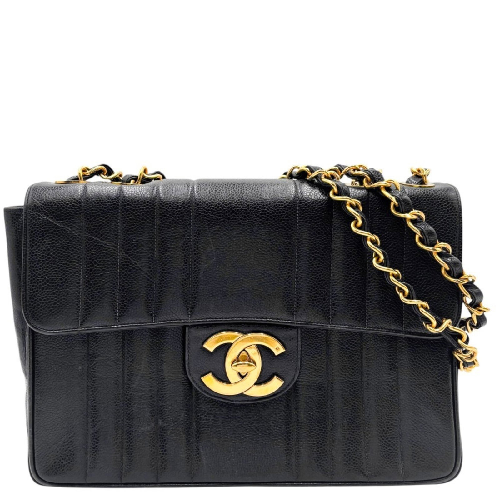 Calfskin Grained Chanel Bag: Calfskin Grained Chanel Bag Calfskin Grained Chanel Bag in Black. This shoulder bag features high-quality grained calfskin material and measures 21.5cm x 30.5cm x 7.5cm, making it a stylish and