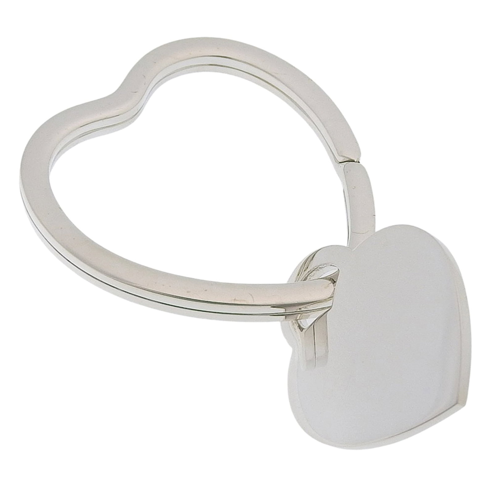 Tiffany silver keyring 925: Tiffany silver keyring 925 Silver 925 Tiffany keyring, crafted from high-quality sterling silver. This elegant keyring features a sleek design and shines with a luxurious silver finish. A beautiful