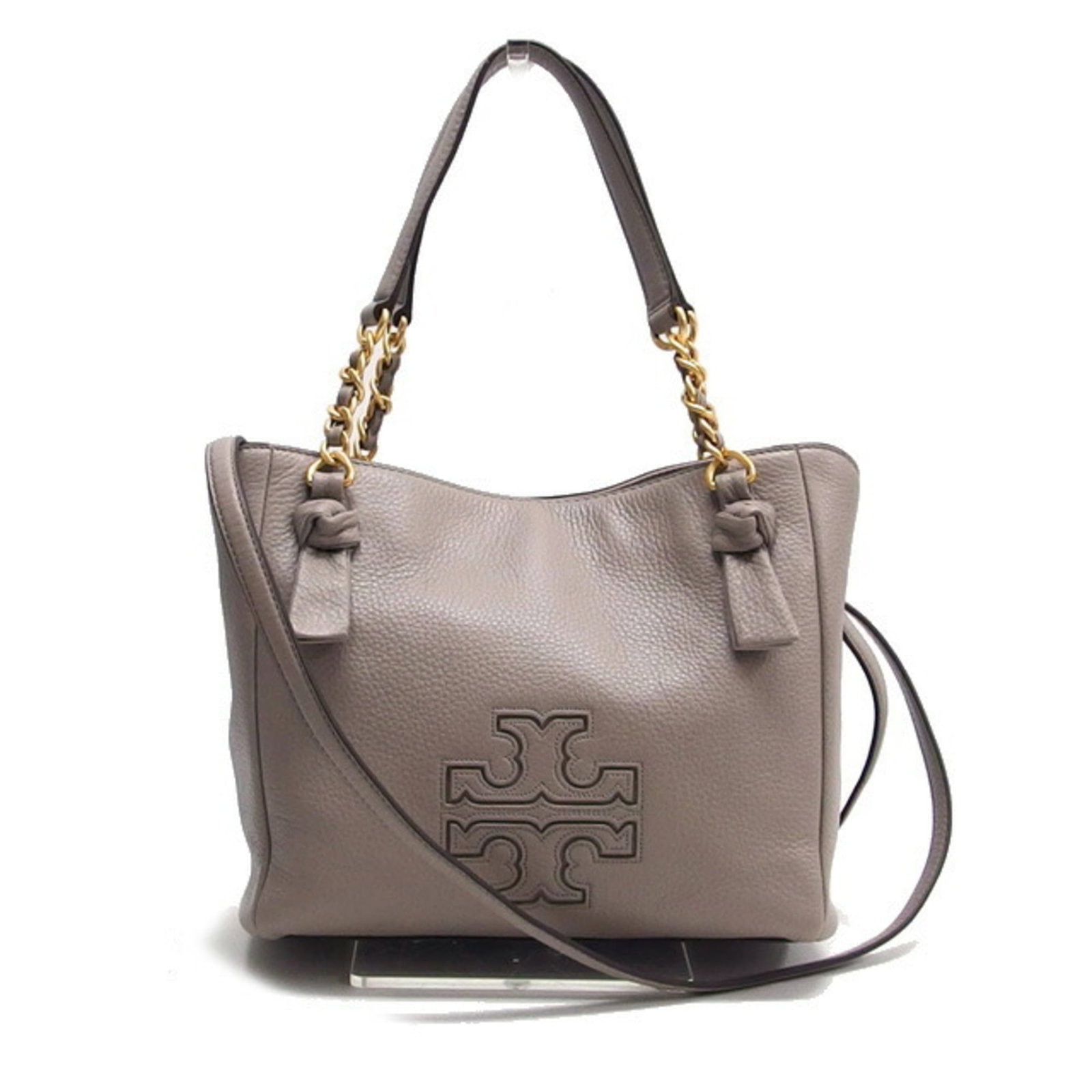 Tory Burch Handbag Shoulder Bag Leather: Tory Burch Handbag Shoulder Bag Leather This Tory Burch shoulder bag features embossed leather in a sleek gray color, complemented by matte gold hardware. The spacious interior and comfortable shoulde