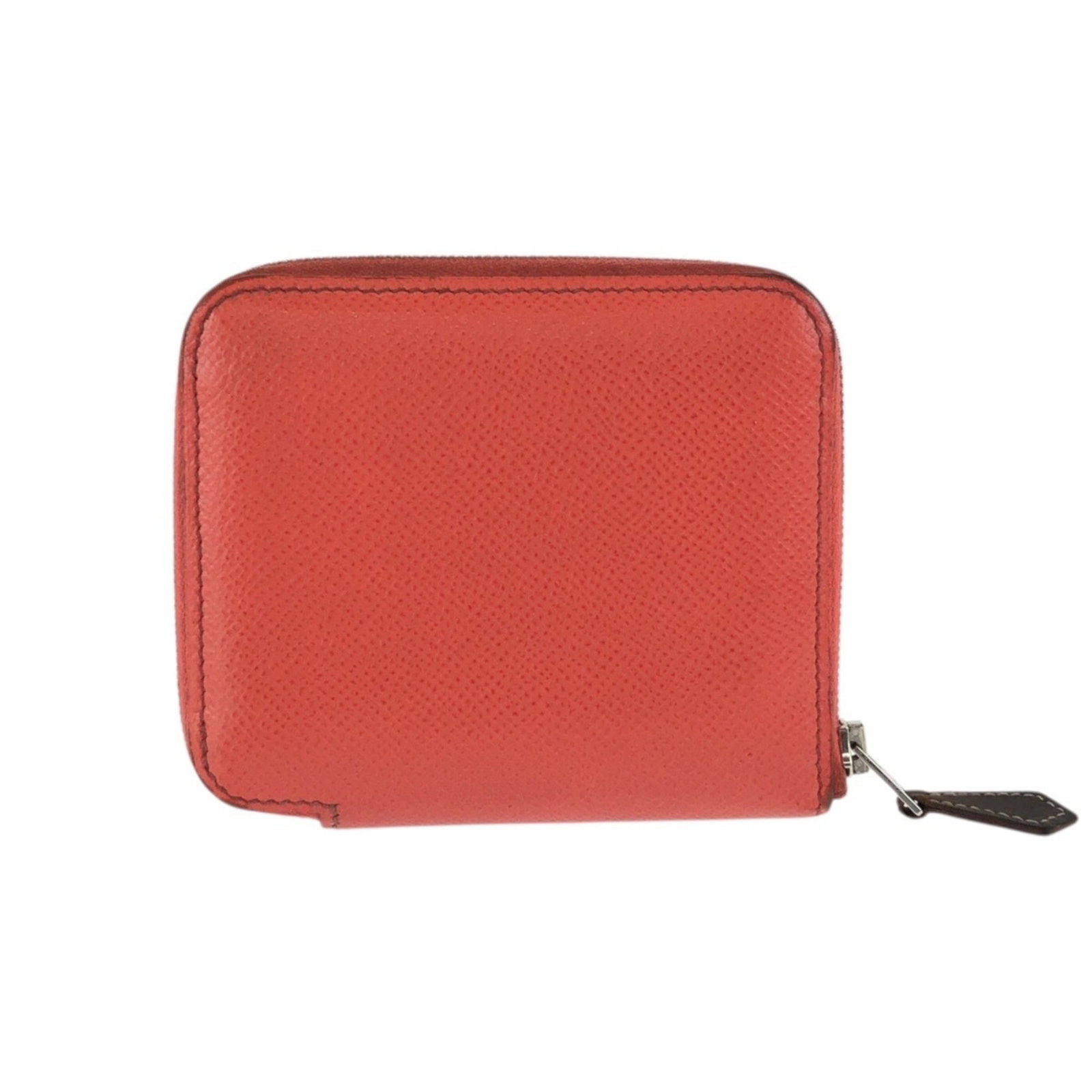 Hermes Coin Purse/ Coin Case Epsom Leather: Hermes Coin Purse/ Coin Case Epsom Leather Epsom leather coin purse from Hermes, featuring a vibrant orange and rose color combination. This compact case measures 10cm x 11.5cm x 1.5cm, making it a