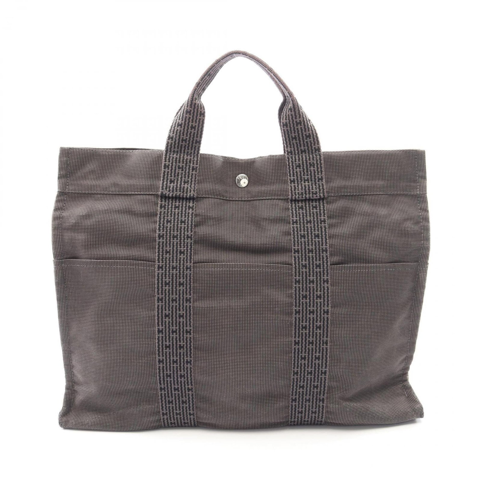 Hermes handbag nylon canvas tote bag: Hermes handbag nylon canvas tote bag Nylon canvas tote bag from Hermes, featuring a classic gray color and durable construction. Measuring 32cm x 42cm x 11cm, it provides ample space for daily essenti
