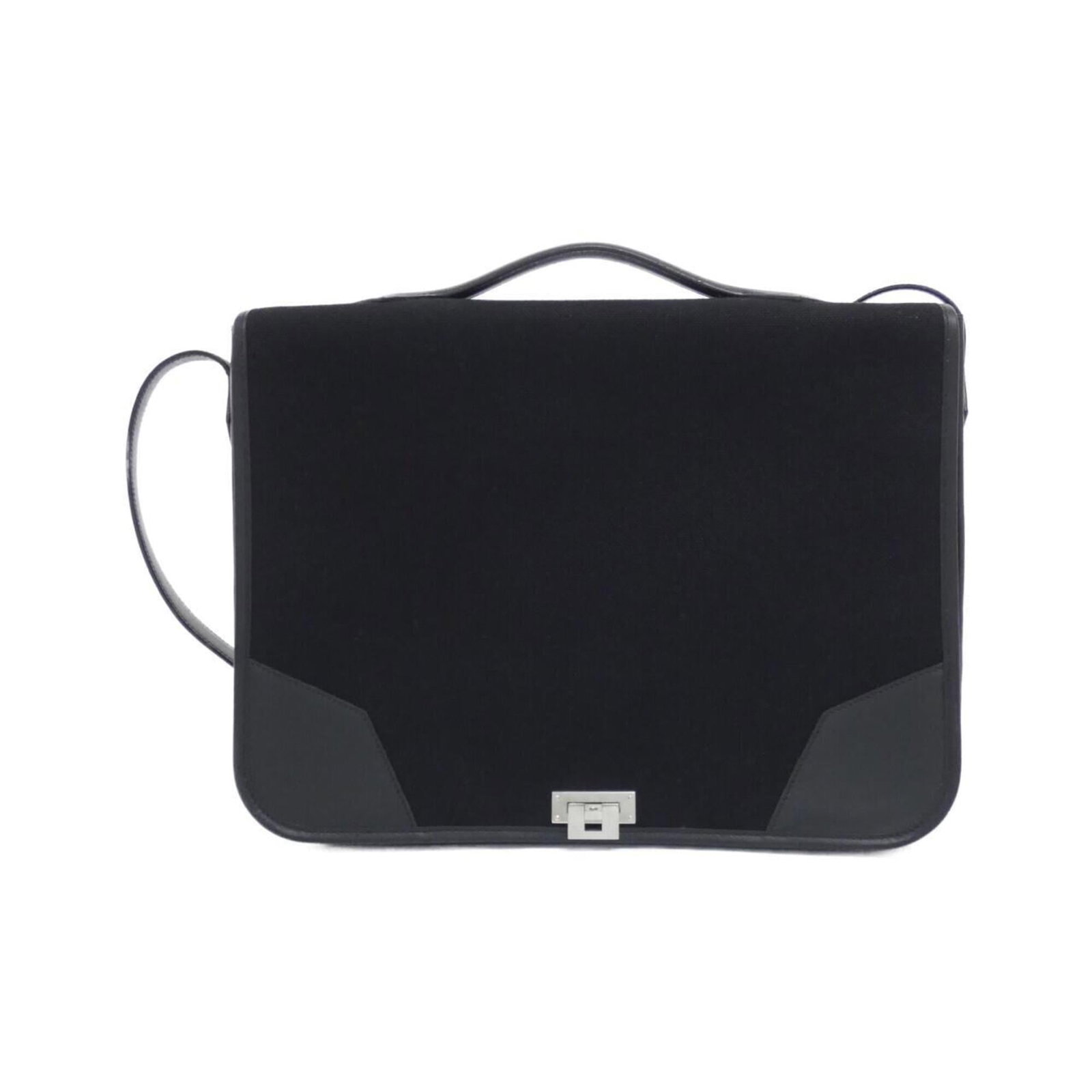 Handbag Canvas by Hermes: Handbag Canvas by Hermes Canvas by Hermes, a sleek and sophisticated handbag in black canvas, measuring 28cm x 38cm x 6cm. The understated design makes it a versatile accessory for everyday use. With 