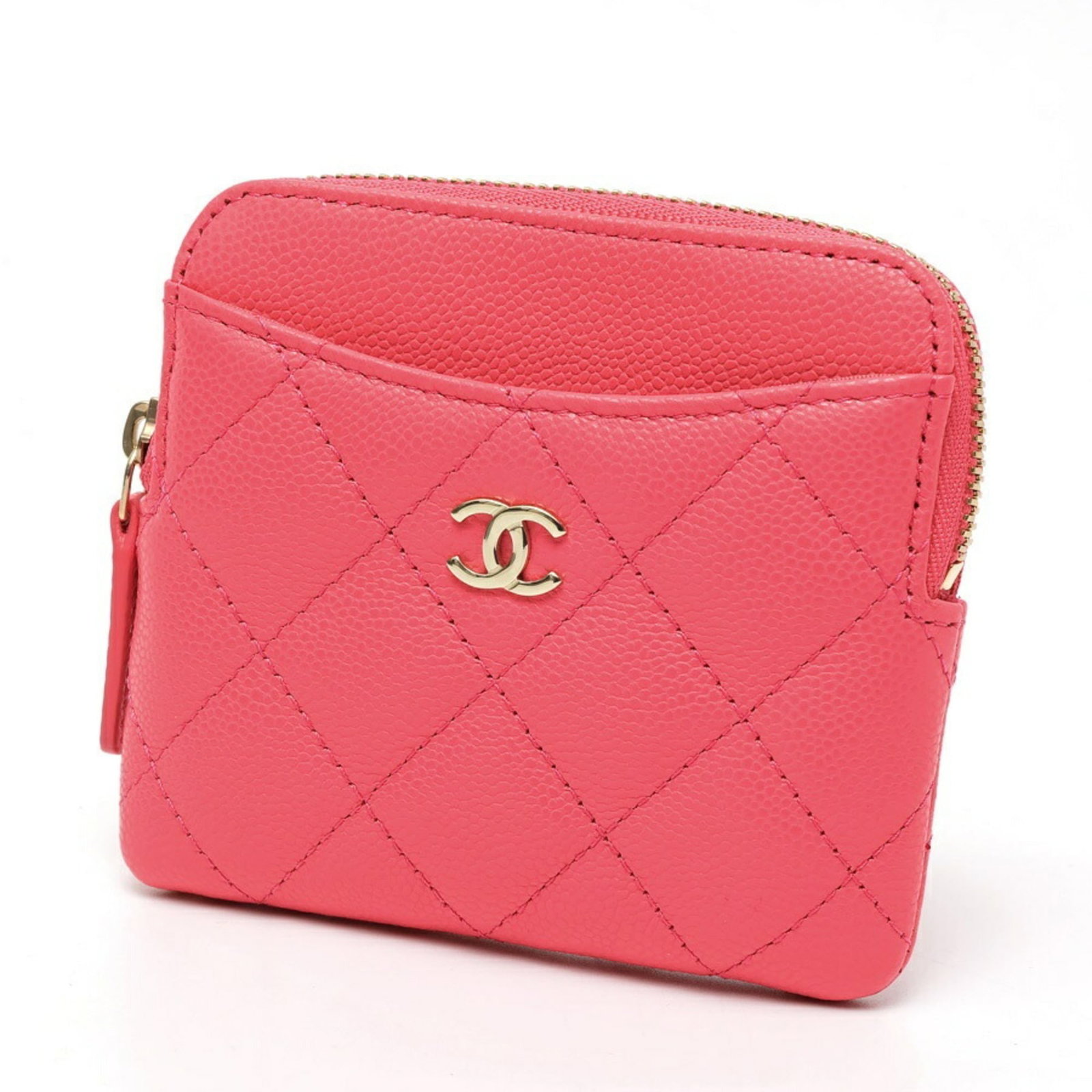 Chanel Coin Purse/ Coin Case Grained Calfskin: Chanel Coin Purse/ Coin Case Grained Calfskin Grained Calfskin Pink Coin Purse from Chanel's Matelasse Collection. This stylish coin case features a soft pink hue and is crafted from high-quality grai