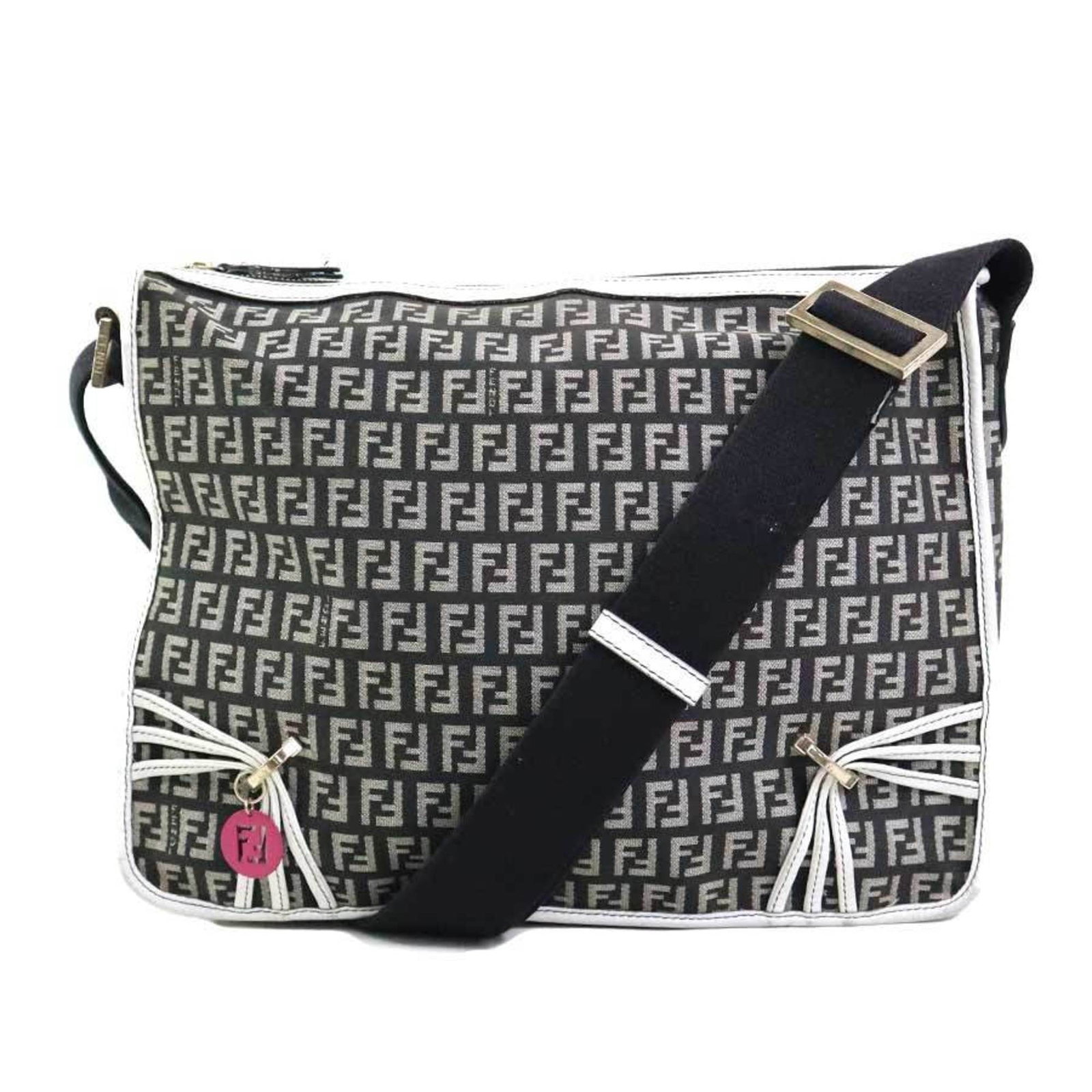 Nylon canvas leather shoulder bag by Fendi: Nylon canvas leather shoulder bag by Fendi Nylon canvas and leather shoulder bag by Fendi, measuring 23cm x 32cm x 10cm. This stylish bag features a sleek black and white color combination made from