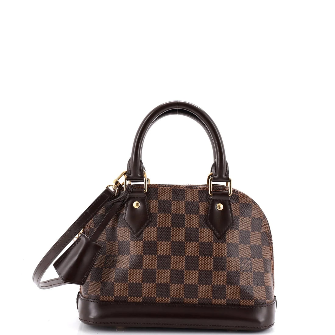 Handbag Louis Vuitton Alma Damier BB: Handbag Louis Vuitton Alma Damier BB The Louis Vuitton Alma Damier BB handbag features a classic design with a canvas-coated leather exterior in brown, complemented by a striking red interior. This