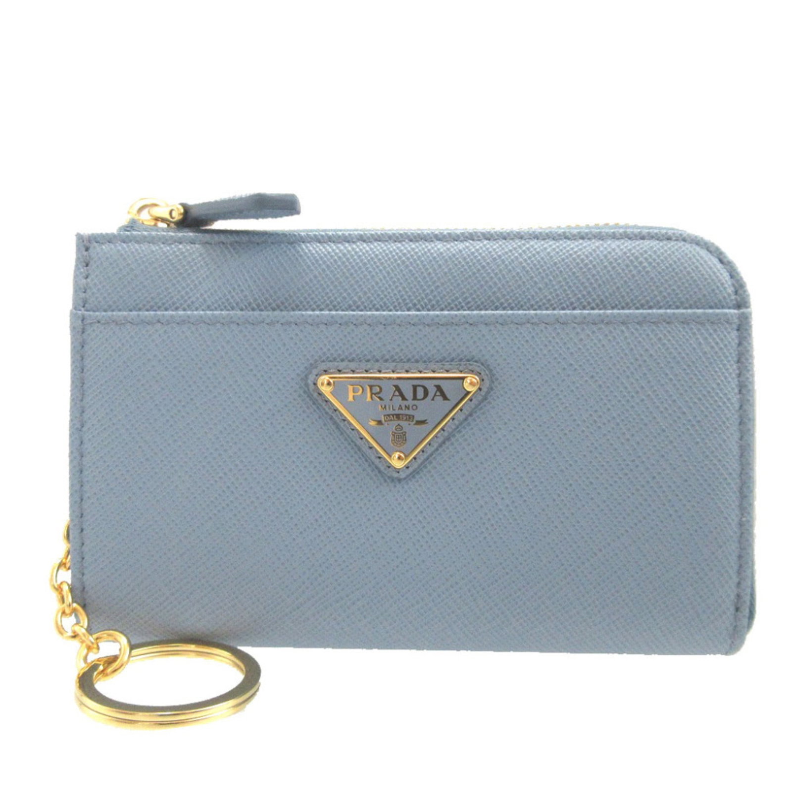 Card case saffiano triangle: Card case saffiano triangle Saffiano triangle card case in blue, made from high-quality Italian material with a distinctive geometric shape. Measuring 9cm x 13.5cm x 2cm, it provides a sleek and