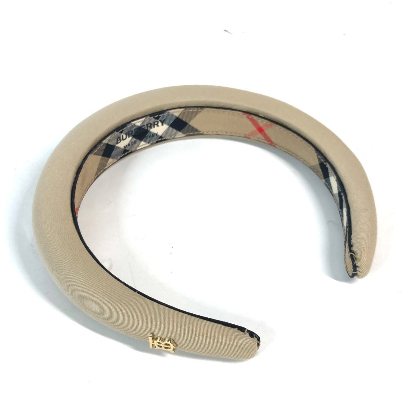 Alice Band Canvas by Burberry: Alice Band Canvas by Burberry Burberry's iconic Alice band canvas is a timeless accessory, featuring a classic beige color and durable canvas material. This compact design measures just 2.5cm x