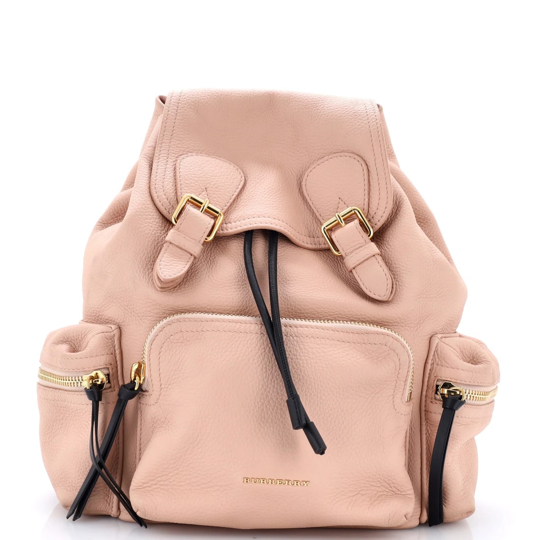 Medium leather rucksack backpack: Medium leather rucksack backpack The Burberry medium leather rucksack backpack boasts a striking pink exterior with heavy corner wear, scuffs, and edge wear. Its sturdy leather construction and gold