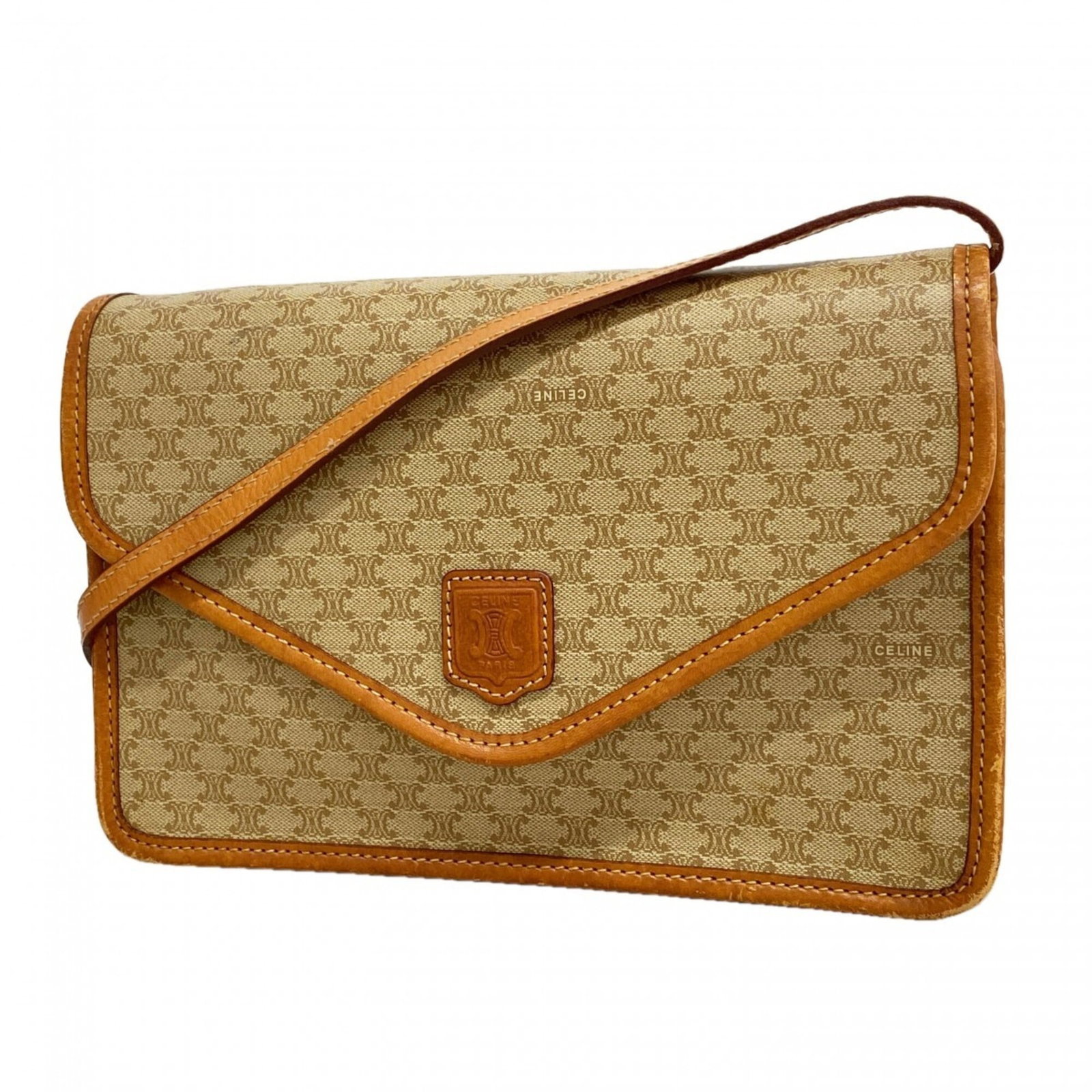 PVC Celine Bag Shoulder: PVC Celine Bag Shoulder Brown PVC Celine Bag with Gold Hardware. This shoulder bag features a unique PVC material and gold hardware, measuring 18cm x 25.5cm x 6cm in size. The bag's distinctive design