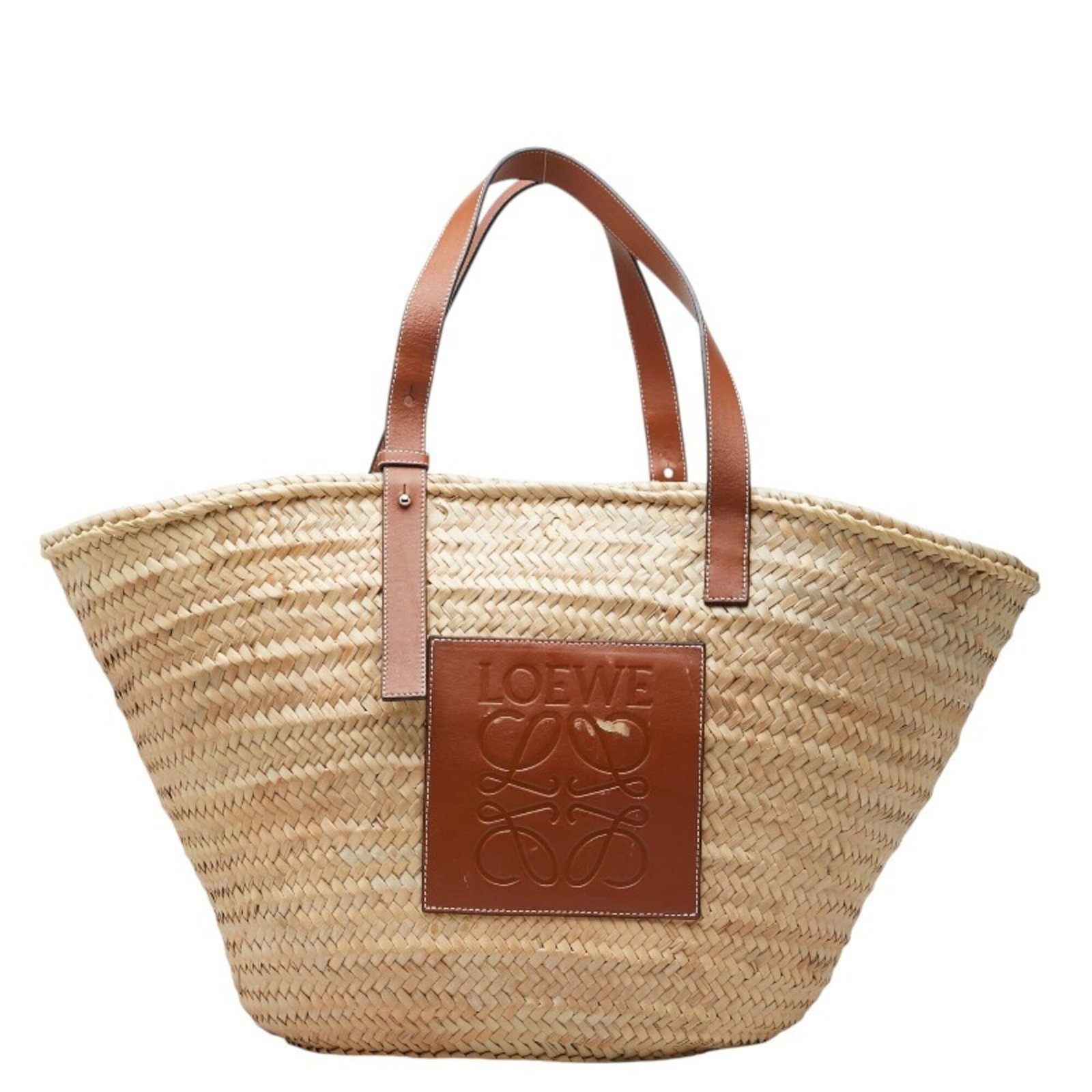 Loewe raffia leather tote bag shoulder basket: Loewe raffia leather tote bag shoulder basket Loewe's raffia leather tote bag features a unique combination of natural materials, with its sturdy raffia and supple calfskin leather. The beige and