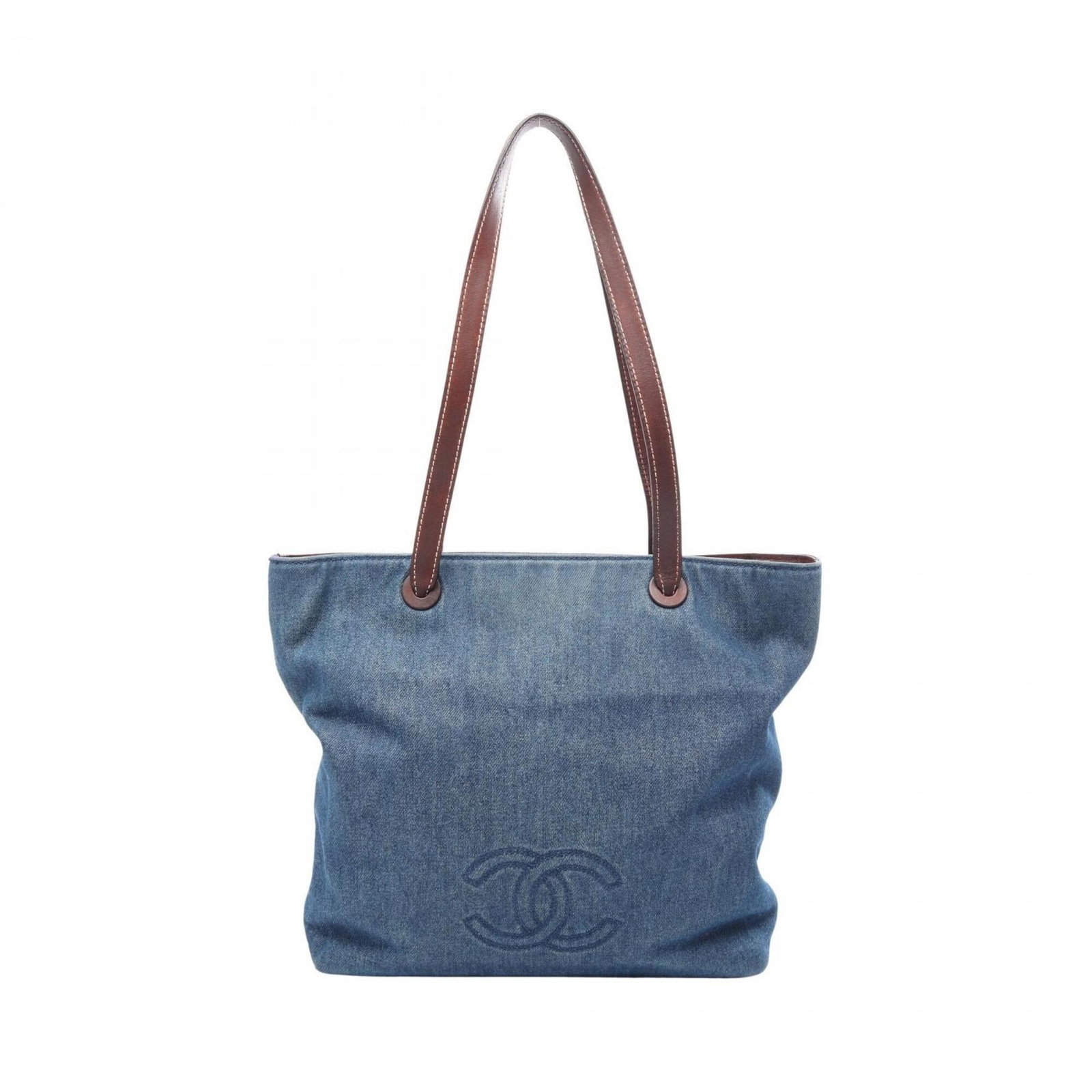 Denim leather tote bag by Chanel: Denim leather tote bag by Chanel Brown and navy denim leather tote bag by Chanel features gold hardware. Made from high-quality denim and leather, this classic design measures 33cm x 31cm x 9cm. A