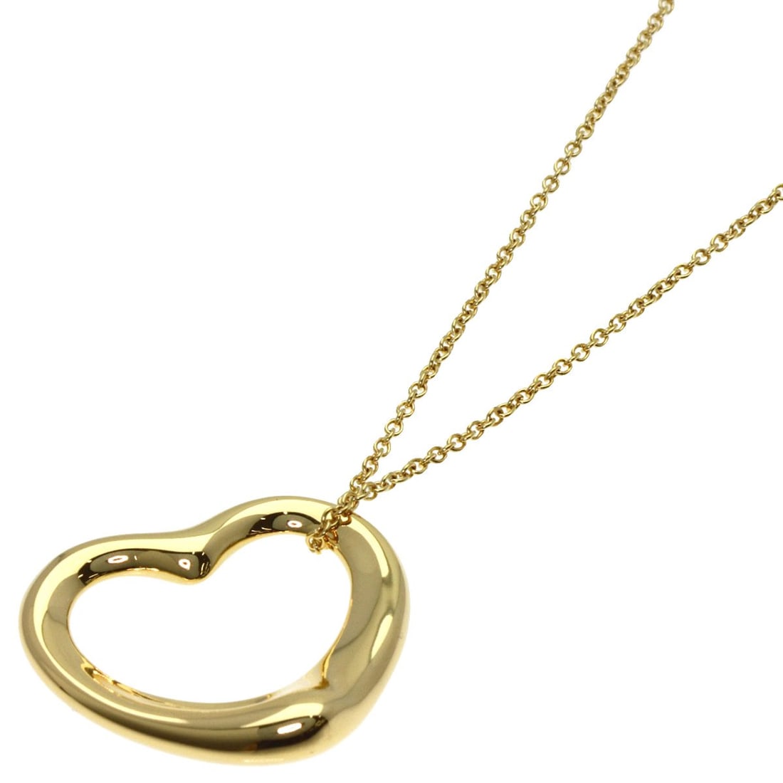 Yellow Gold Tiffany Necklace K18 Open Heart: Yellow Gold Tiffany Necklace K18 Open Heart K18 Yellow Gold Tiffany Necklace Open Heart features a sleek, gold metal design with no main stone. The necklace measures 15.7 inches in length and boasts