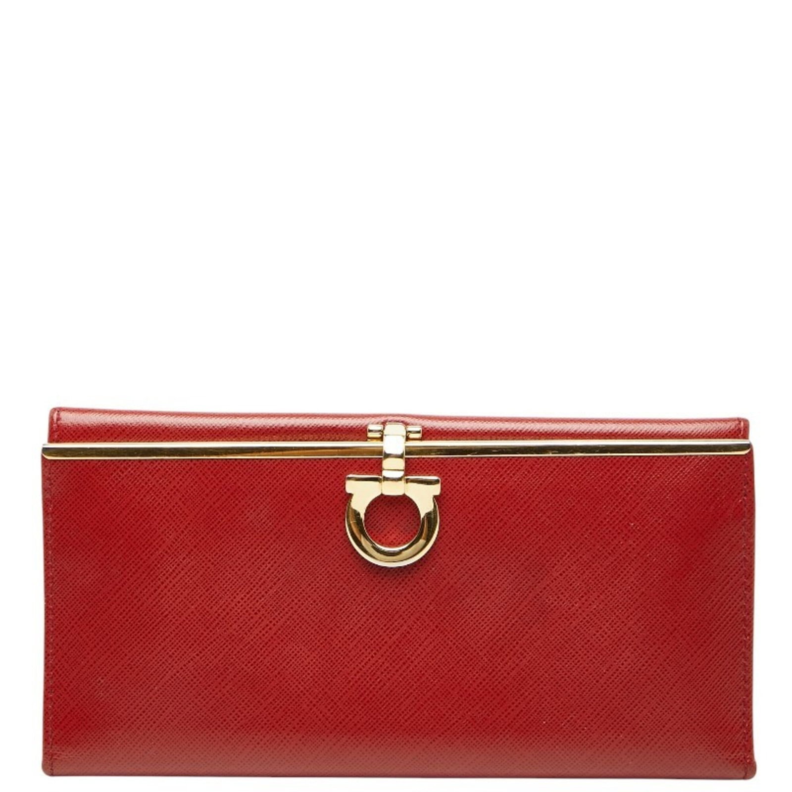 Long Wallet Ferragamo Salvatore Bi Fold Leather: Long Wallet Ferragamo Salvatore Bi Fold Leather Red leather long wallet with bi-fold design, measuring 10cm x 19cm x 2cm. Made from high-quality leather, this stylish accessory features a classic and 