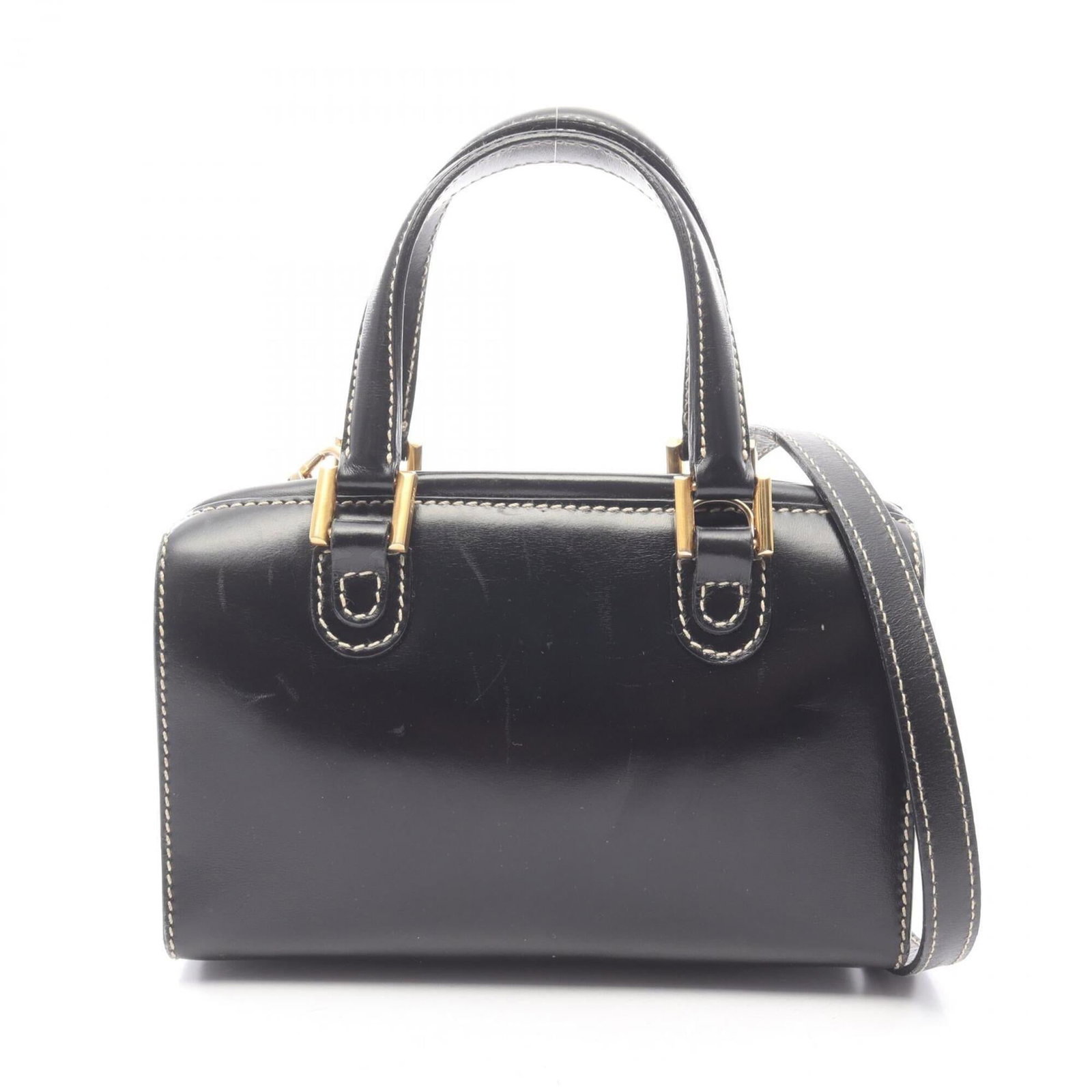 Fendi Handbag Leather: Fendi Handbag Leather Black Fendi Handbag Leather measures 14cm x 20.5cm x 9cm, with a sleek design and luxurious leather material. The bag's signature style is evident in its classic shape and