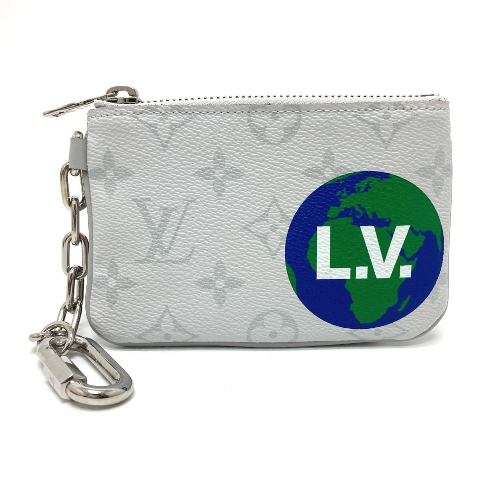 Louis Vuitton Purse Coin Case Monogram: Louis Vuitton Purse Coin Case Monogram The Louis Vuitton Purse Coin Case Monogram features the iconic monogram pattern in white, adding a touch of timeless elegance to any accessory. This compact