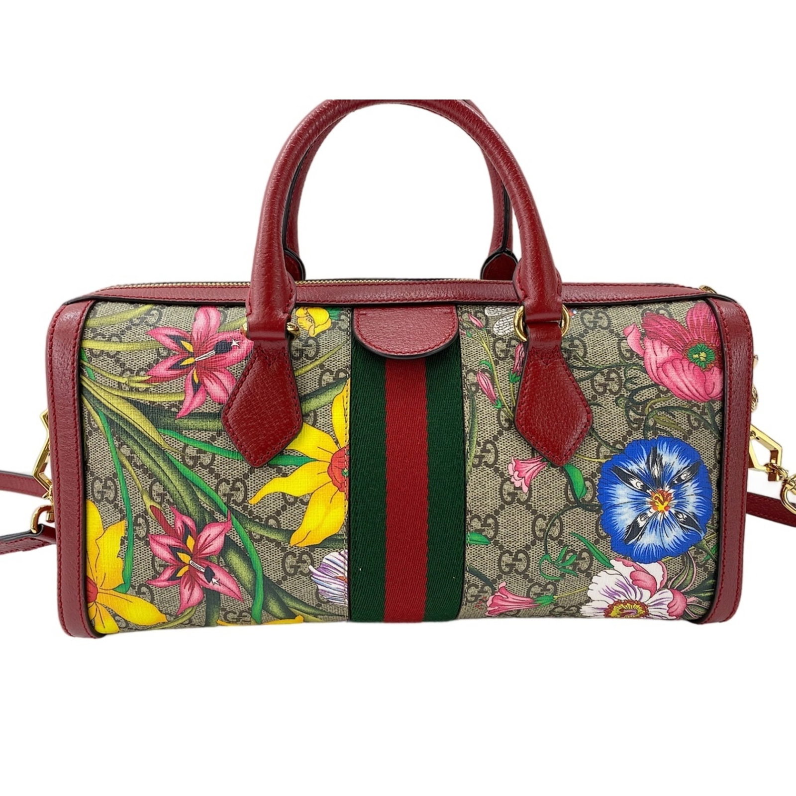 Handbag by Gucci: Handbag by Gucci Gucci's Flora handbag boasts a timeless beige color and elegant design, featuring a sturdy structure with a handle drop of 12.00cm. The bag measures 16cm x 32cm x 12cm in size, making