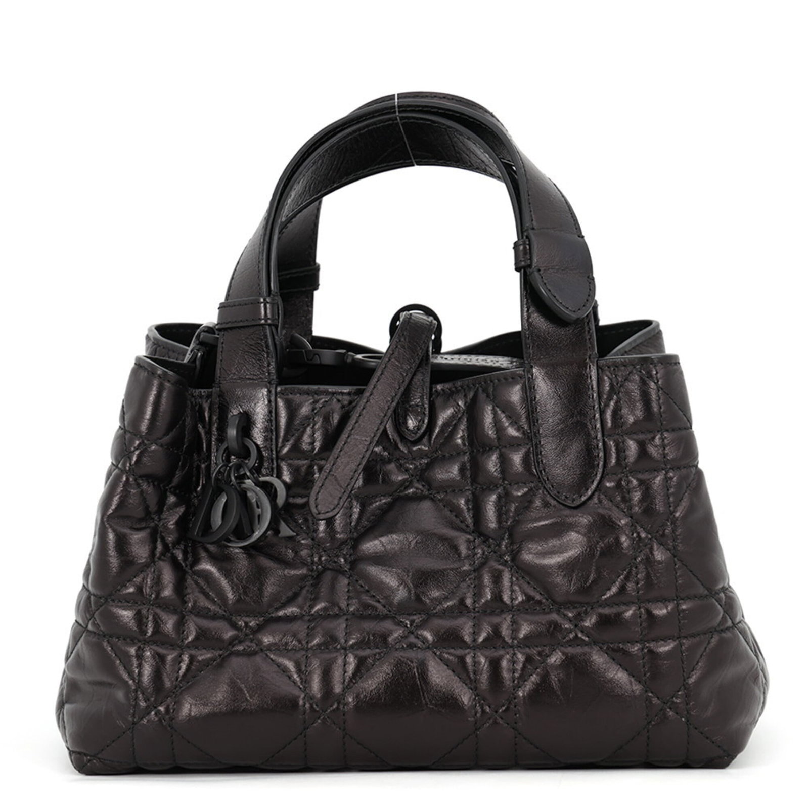 Handbag Christian Dior Leather: Handbag Christian Dior Leather This luxurious handbag from Christian Dior boasts sleek metallic black leather and an open closure, showcasing the brand's signature style. Made in Italy, it measures 14
