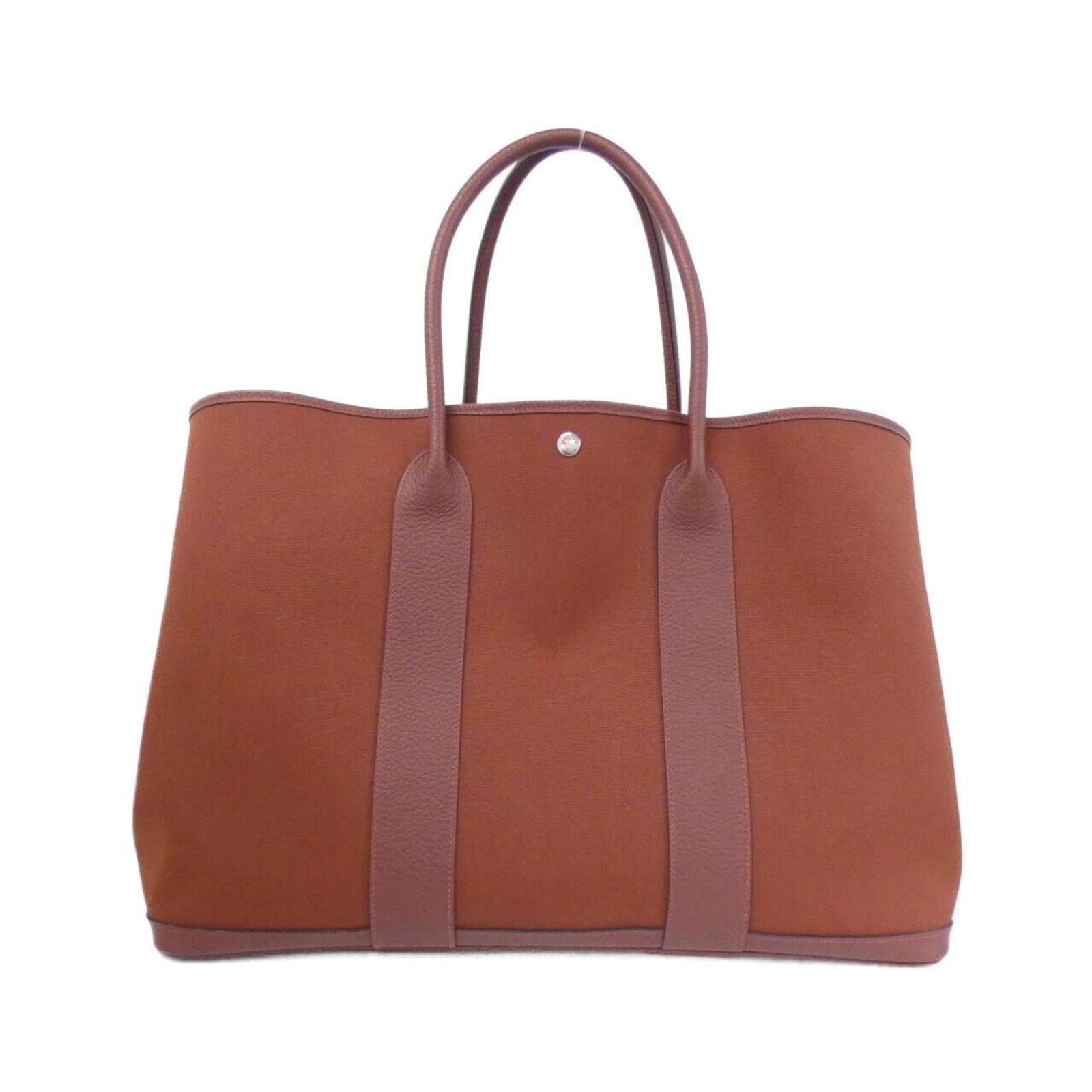 Handbag Country Leather by Hermes: Handbag Country Leather by Hermes Country leather handbag from Hermes, featuring a classic design with a signature Rouge color and silver hardware. This stylish bag measures 35cm x 49cm x 25cm, making