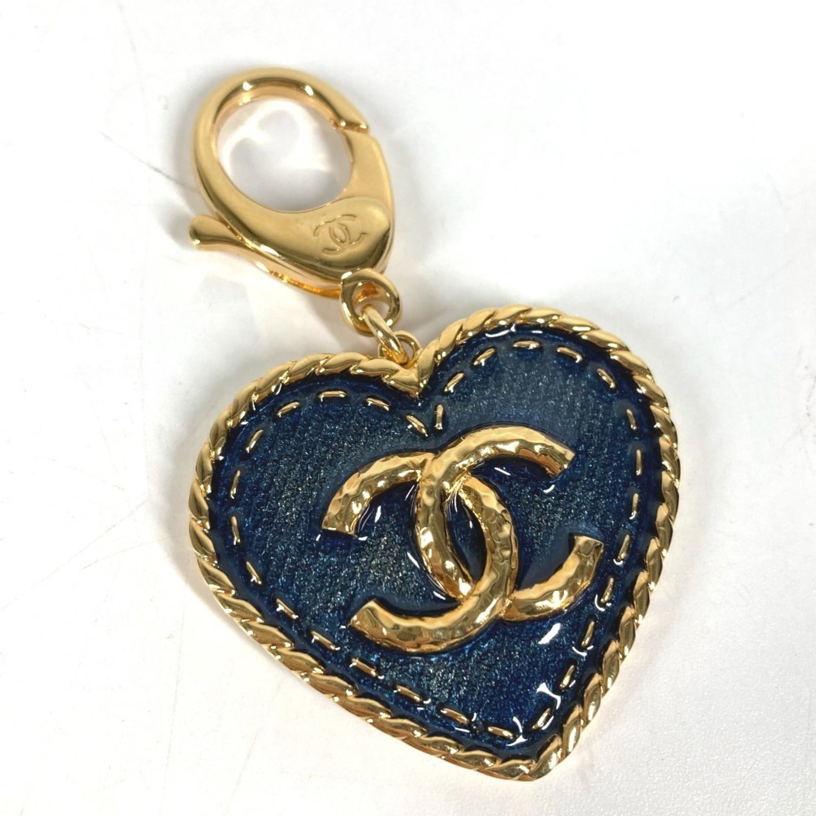 Chanel Keyring Metal: Chanel Keyring Metal Blue Chanel Keyring Metal. Made from metal, this keyring features the iconic Chanel brand. Comes in a box for storage and display. Item Specifics: Brand: Chanel Country of