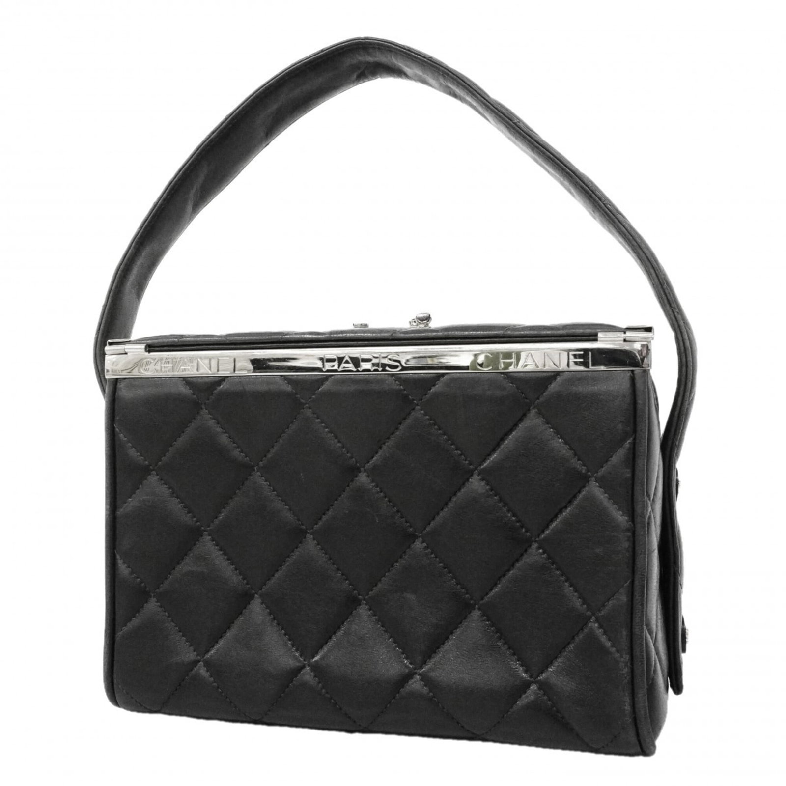 Leather Handbag Chanel: Leather Handbag Chanel Black lambskin leather Chanel handbag with silver hardware, measuring 14cm x 19cm x 10.5cm in size. This classic design showcases the iconic brand's signature style and