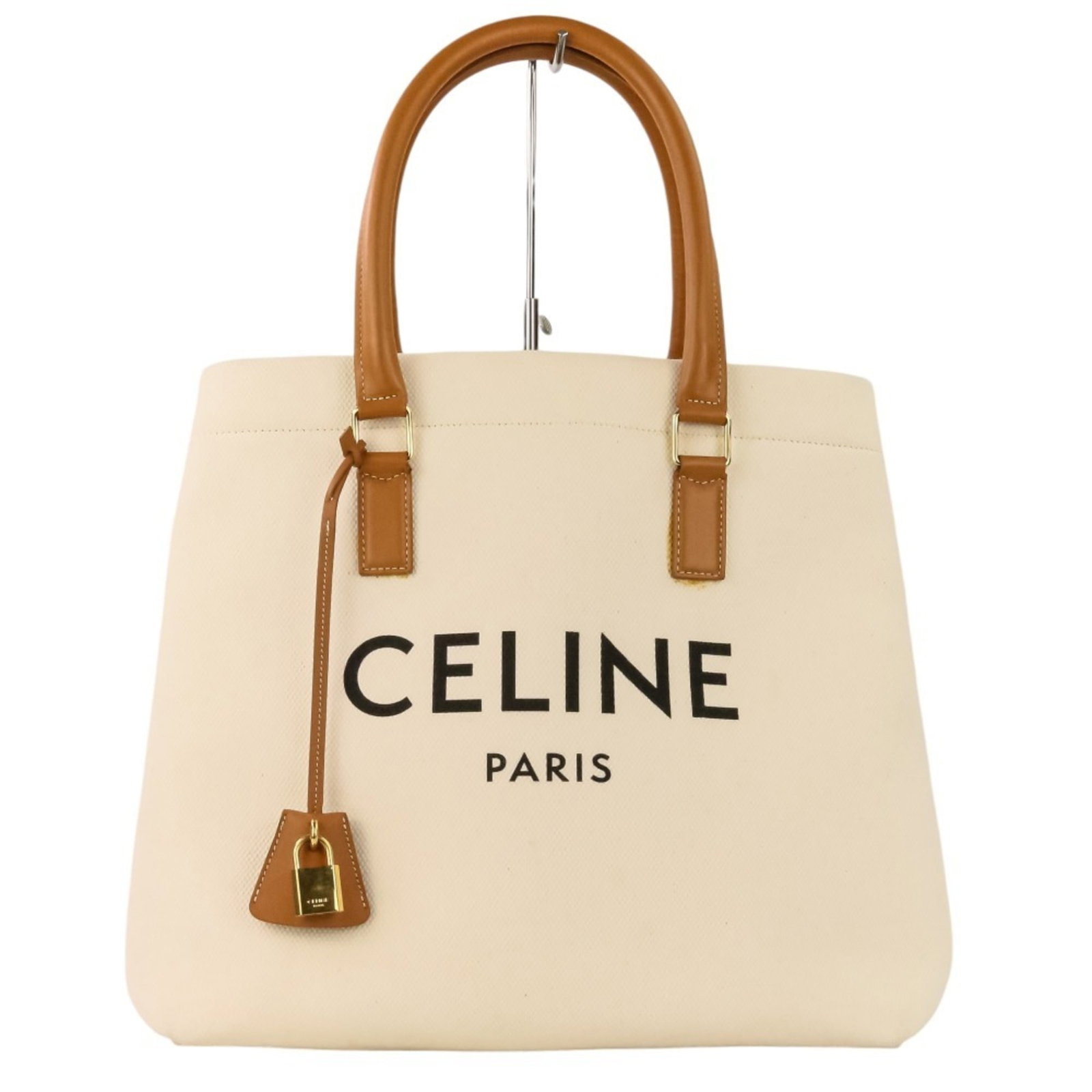 Celine Handbag Tote Bag: Celine Handbag Tote Bag White Celine Handbag Tote Bag, measuring 32cm x 33cm x 20cm, offers a sleek and modern design. This spacious tote features a crisp white color that adds a touch of sophisticati