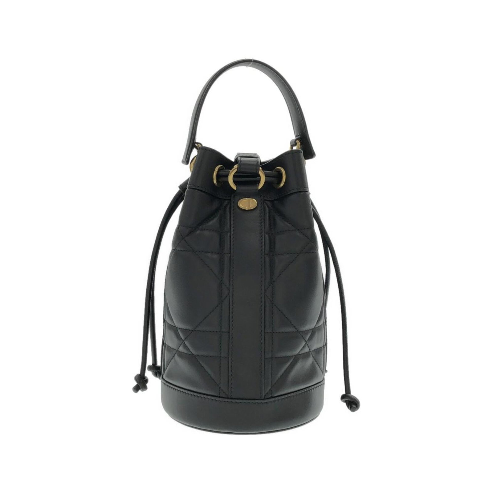 Christian Dior Leather Backpack: Christian Dior Leather Backpack The Christian Dior Leather Backpack boasts sleek, all-black design with premium calfskin material. Its compact size and durable construction make it an ideal accessory