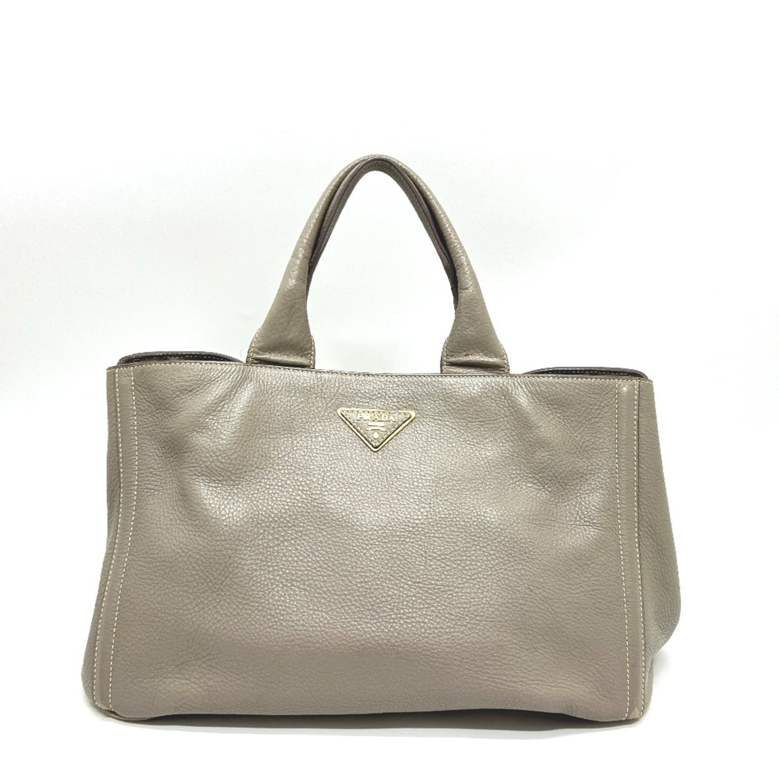 Tote Bag Canapa Handbag: Tote Bag Canapa Handbag The Prada MPN BN1872 Canapa Handbag features a timeless design with a sturdy canapa material and sleek gray color. Measuring 25cm x 38cm x 24cm, it comes with a dust bag for