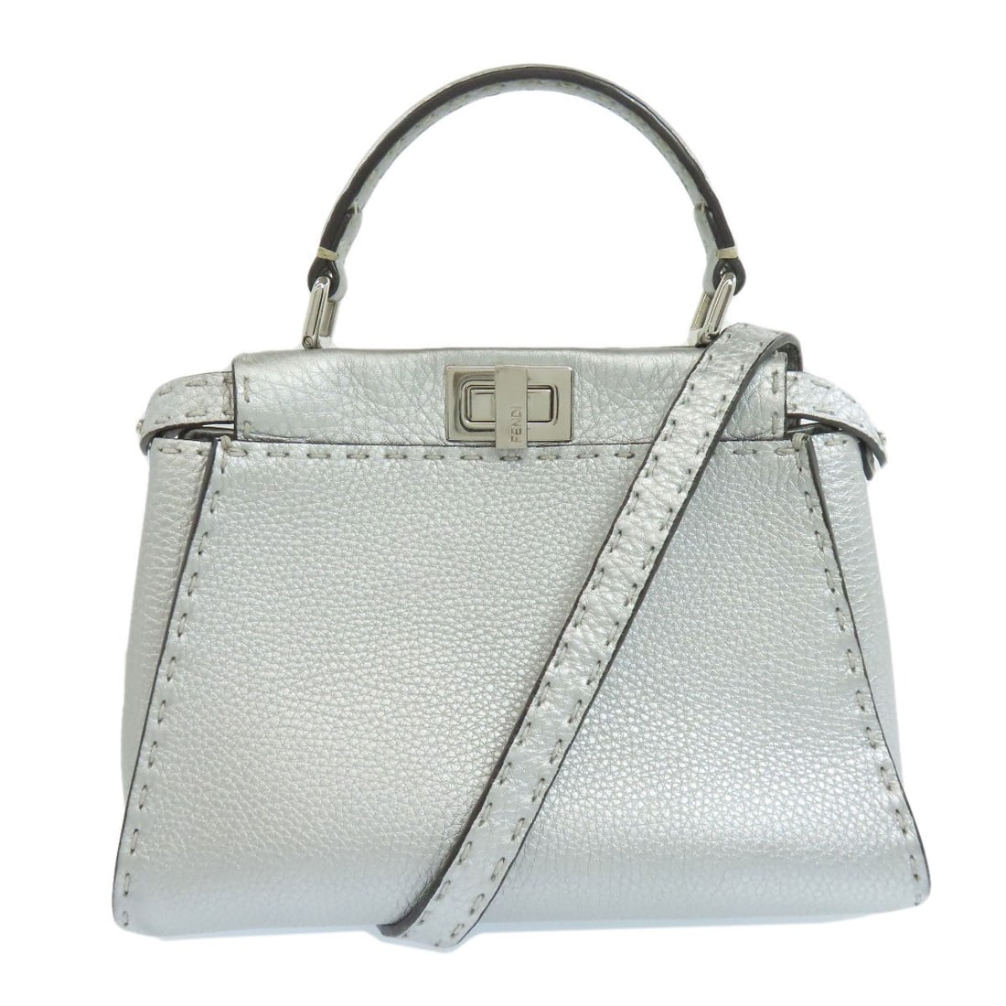 Selleria Calf Peekaboo Handbag 2way Mini Fendi: Selleria Calf Peekaboo Handbag 2way Mini Fendi Silver Calf Peekaboo Handbag with Fendi Style, featuring a sleek and sophisticated design. This 2way Mini Fendi handbag boasts a striking silver exterior