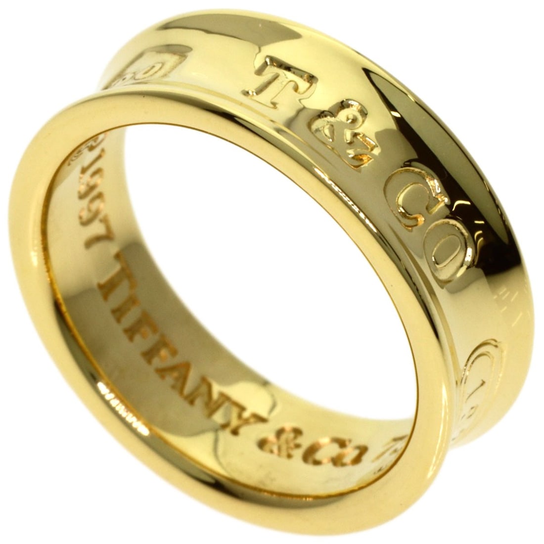 Tiffany Co gold ring K18 yellow: Tiffany Co gold ring K18 yellow K18 yellow gold Tiffany Co ring, featuring the iconic brand's signature style and exceptional craftsmanship. This 5 US ring size piece boasts a rich, vibrant gold tone 