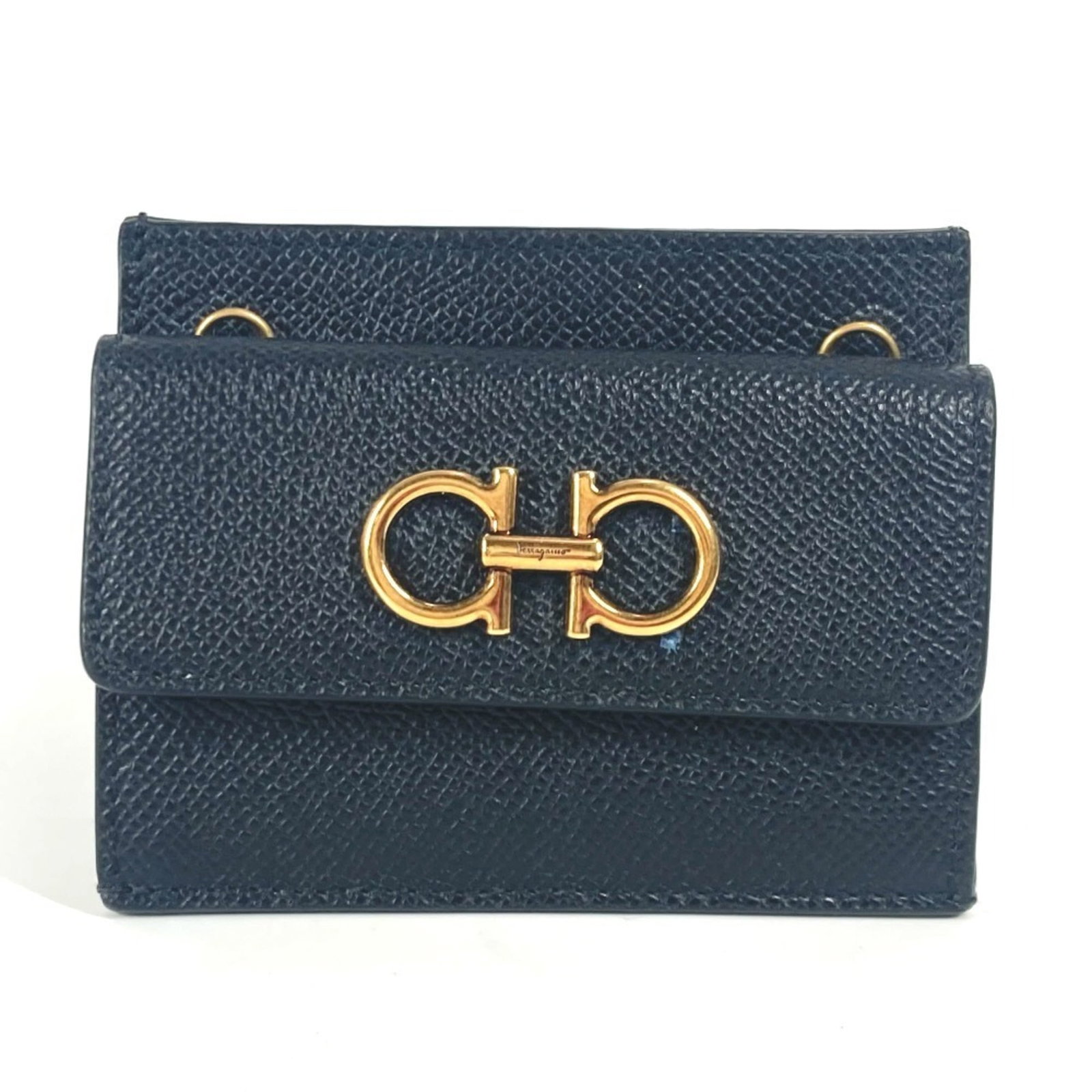 Salvatore Ferragamo leather business case: Salvatore Ferragamo leather business case Black leather business case from Salvatore Ferragamo's Gancini line, measuring 8cm x 10cm. This sleek and sophisticated case features high-quality leather con