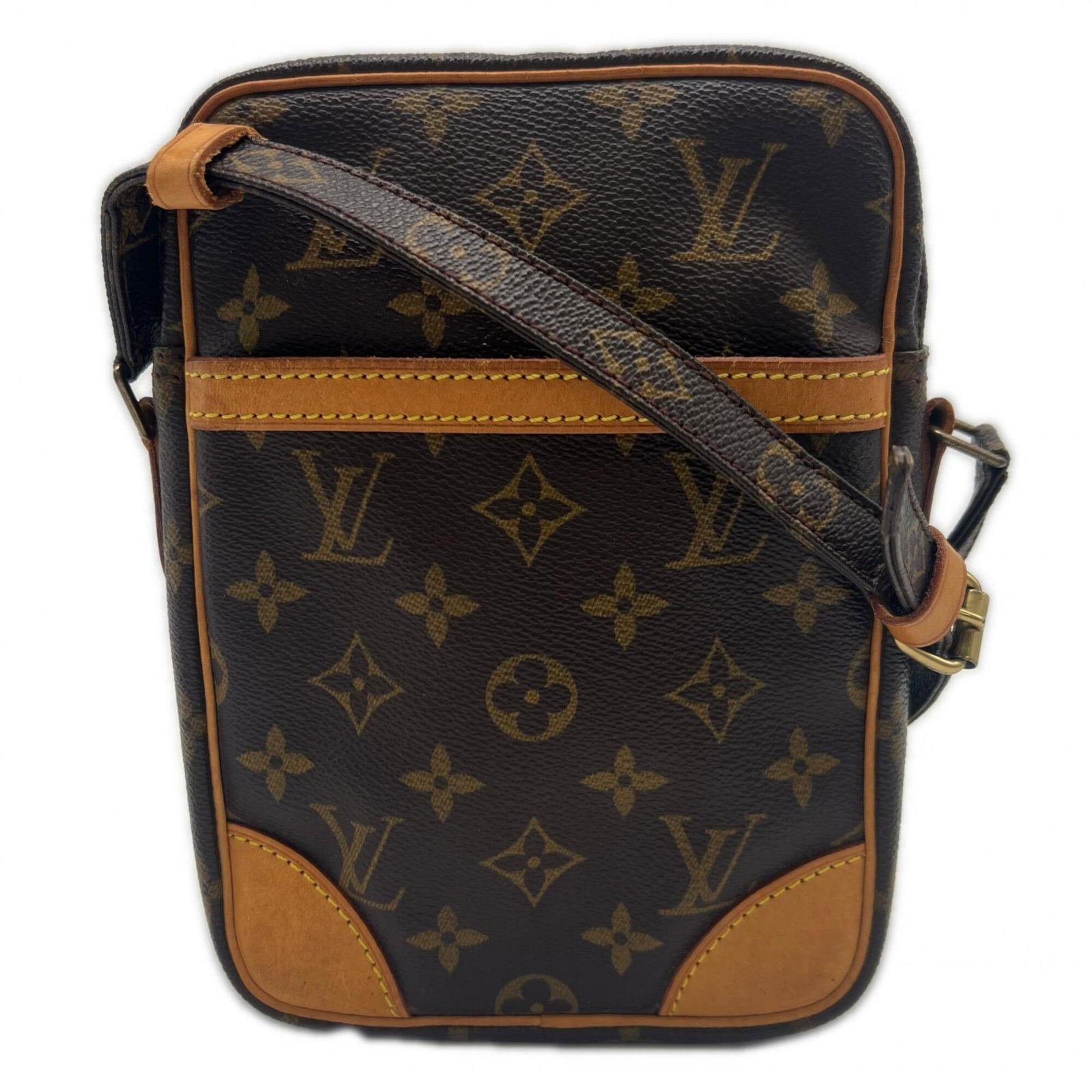 Shoulder bag from Louis Vuitton: Shoulder bag from Louis Vuitton This Louis Vuitton Monogram shoulder bag boasts its iconic beige and brown color combination, making it a stylish addition to any outfit. With a durable zipper closure