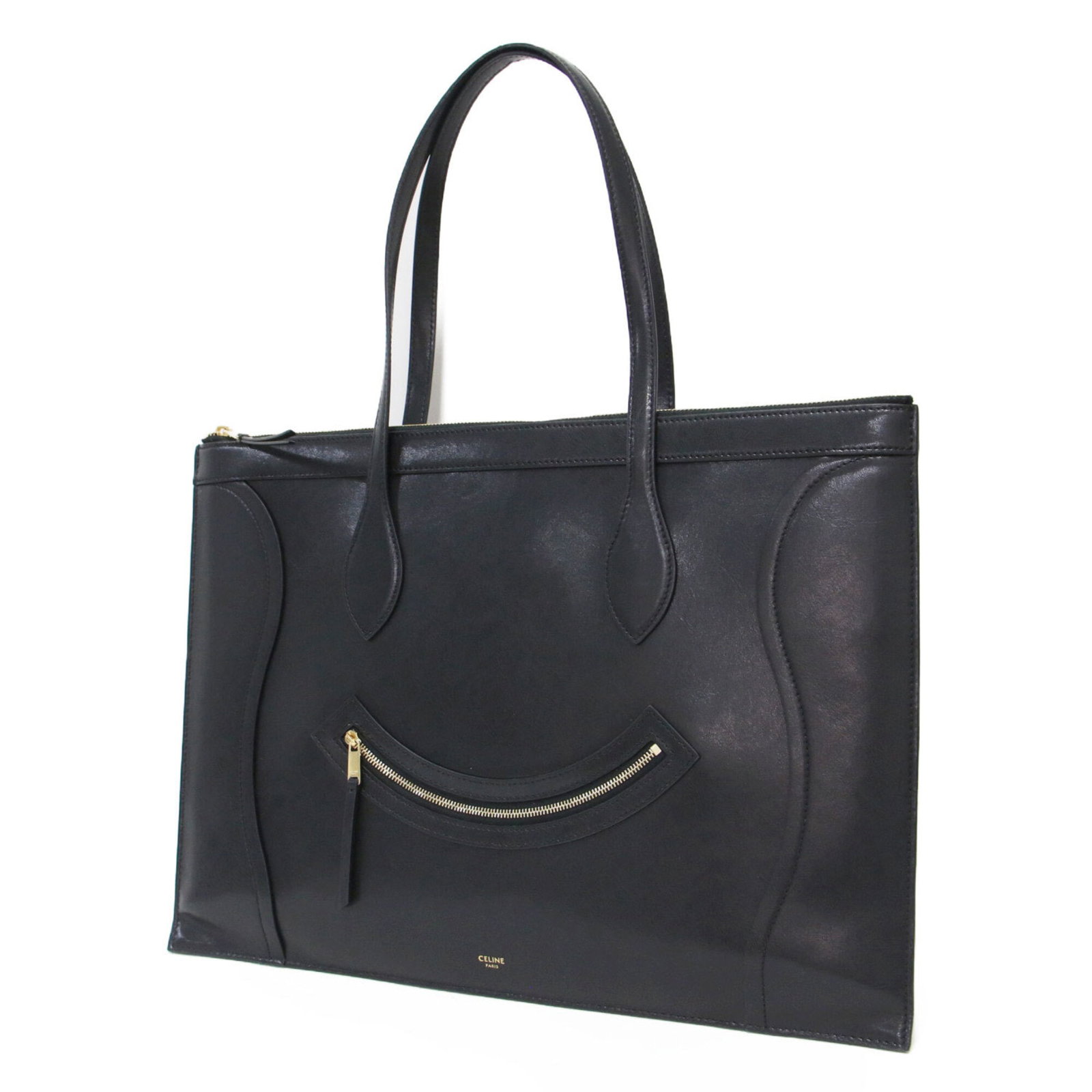 Leather Tote Celine Handbag: Leather Tote Celine Handbag Black Calfskin Leather Tote Bag from Celine, Italy. This sleek and sophisticated tote measures 31.5cm x 44cm / 12.4'' x 17.32'', perfect for everyday use. Made from high-qu