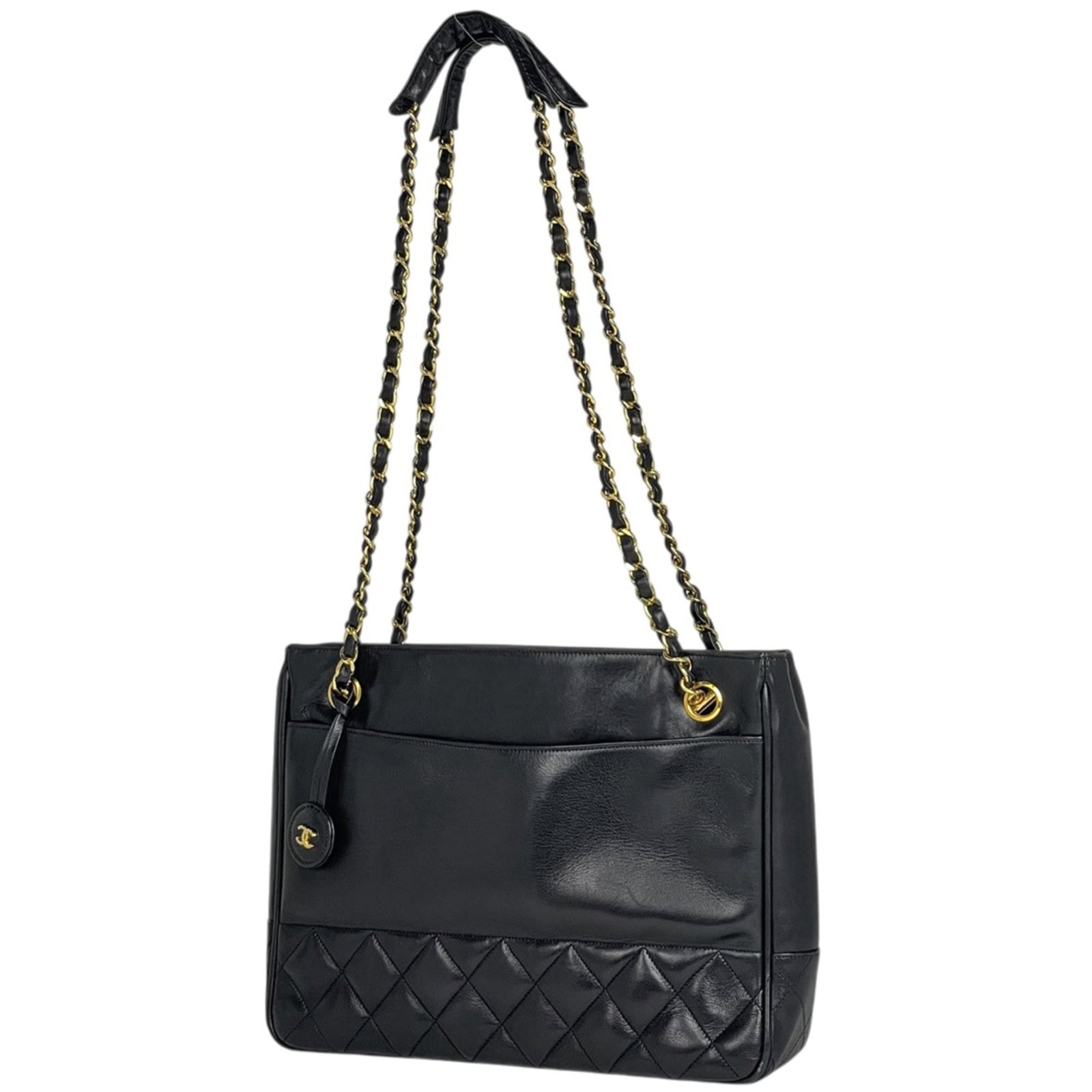 Chanel tote leather bag: Chanel tote leather bag Black leather Chanel tote bag with dimensions 21cm x 28.5cm x 7cm, bearing a signature. This classic design features high-quality leather construction and a timeless