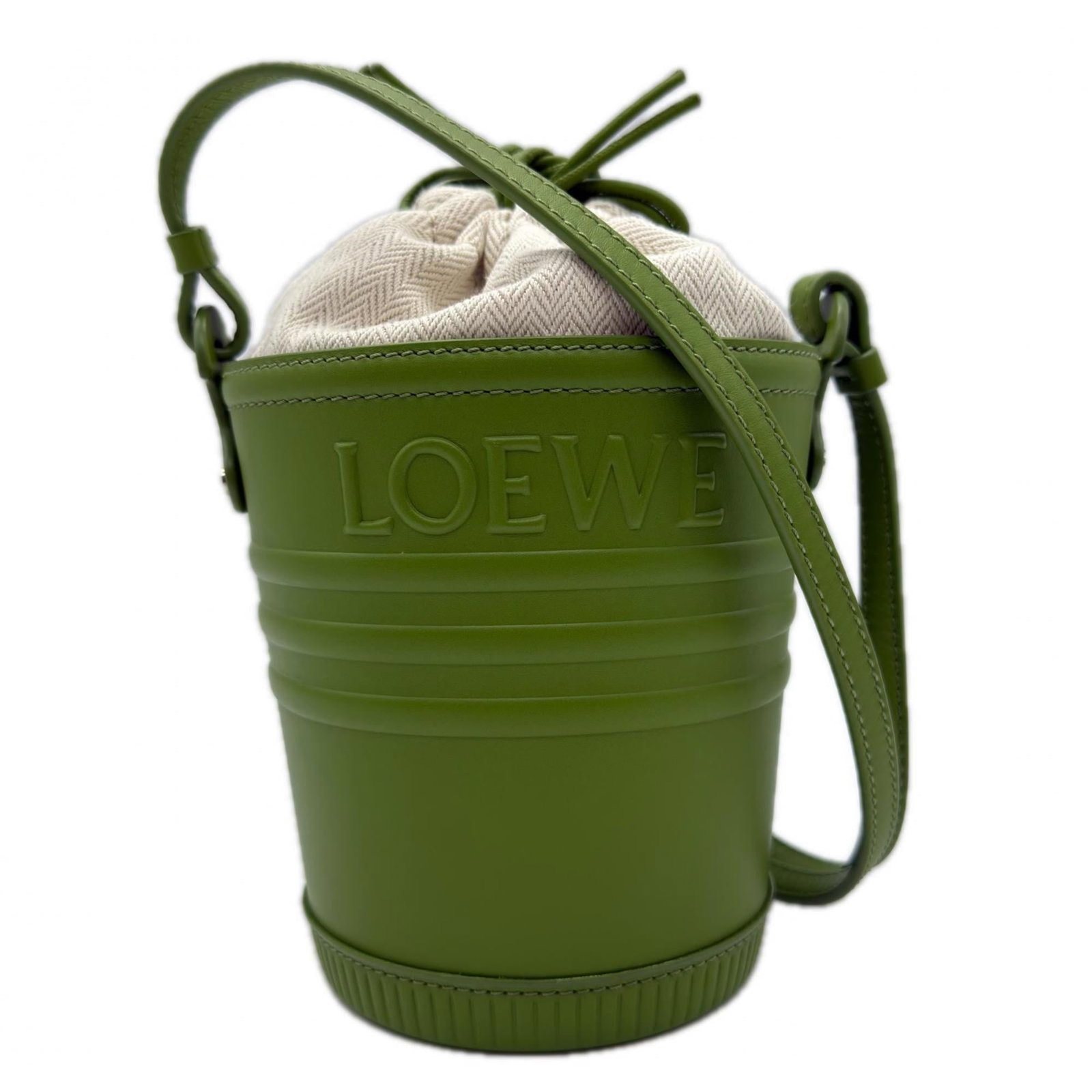 Shoulder Bag Canvas Leather By: Shoulder Bag Canvas Leather By Canvas and leather combine in this stylish shoulder bag from Loewe, featuring a vibrant green color. The bag's calfskin leather and canvas material provide a unique